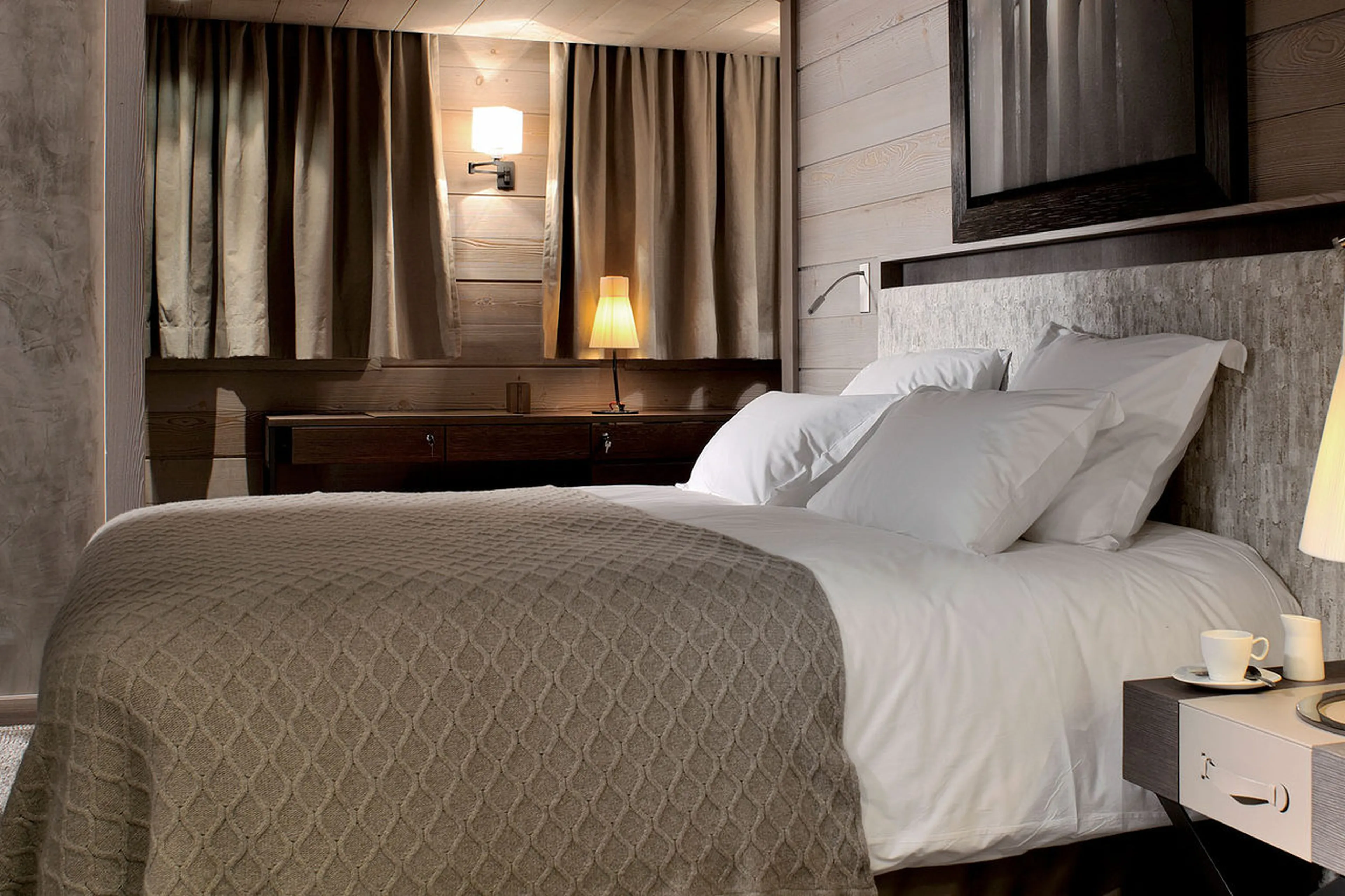 Master double bedroom with dressing area and en-suite bathroom in Apartment Ruby in Courchevel 1850