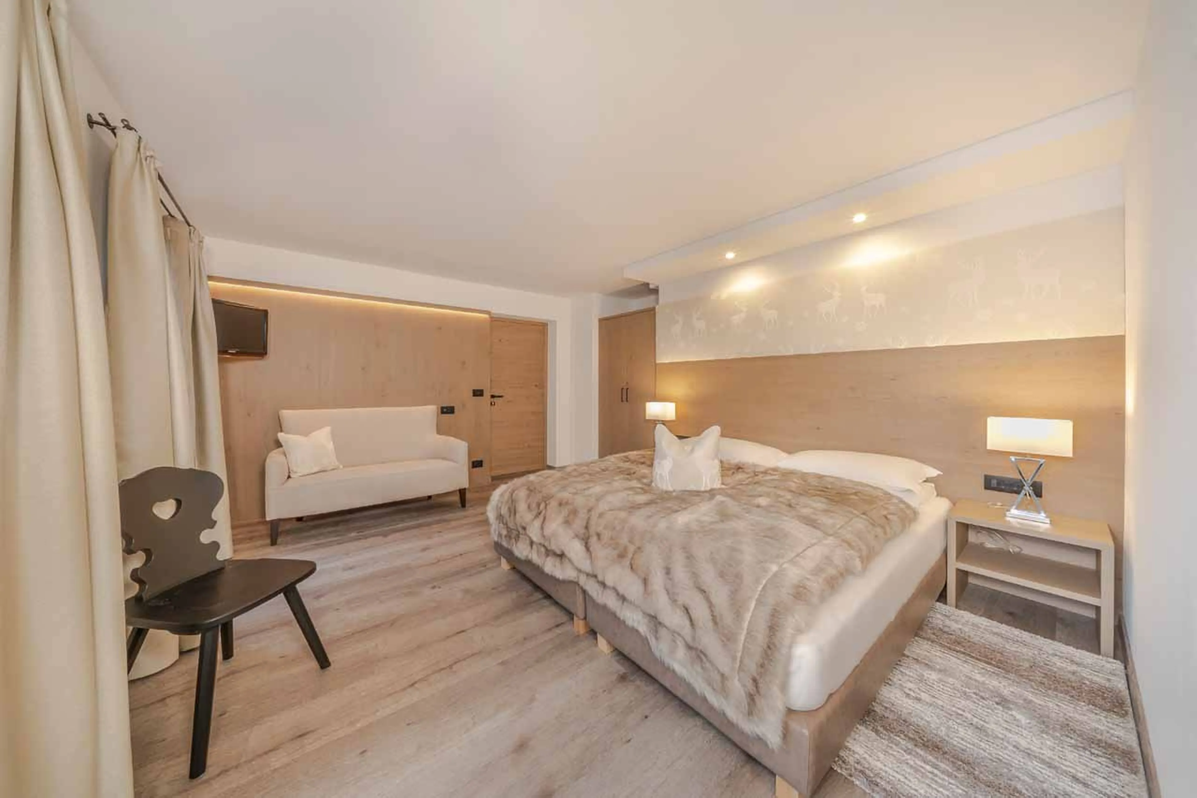 Bedroom one at Apartment Selva in Val Gardena