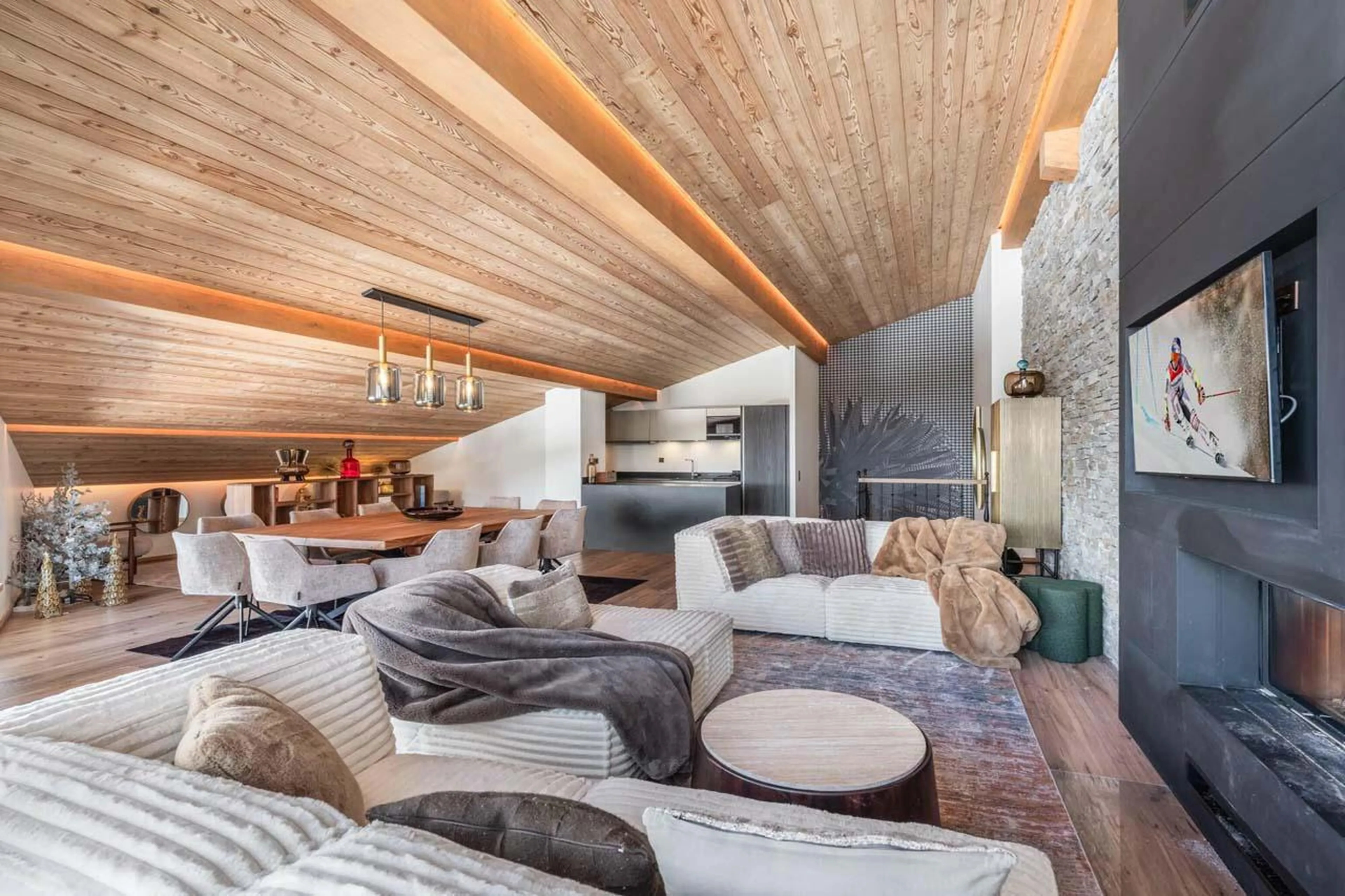 Sociable kitchen overlooking living area at Apartment Sirio in Courchevel 1850