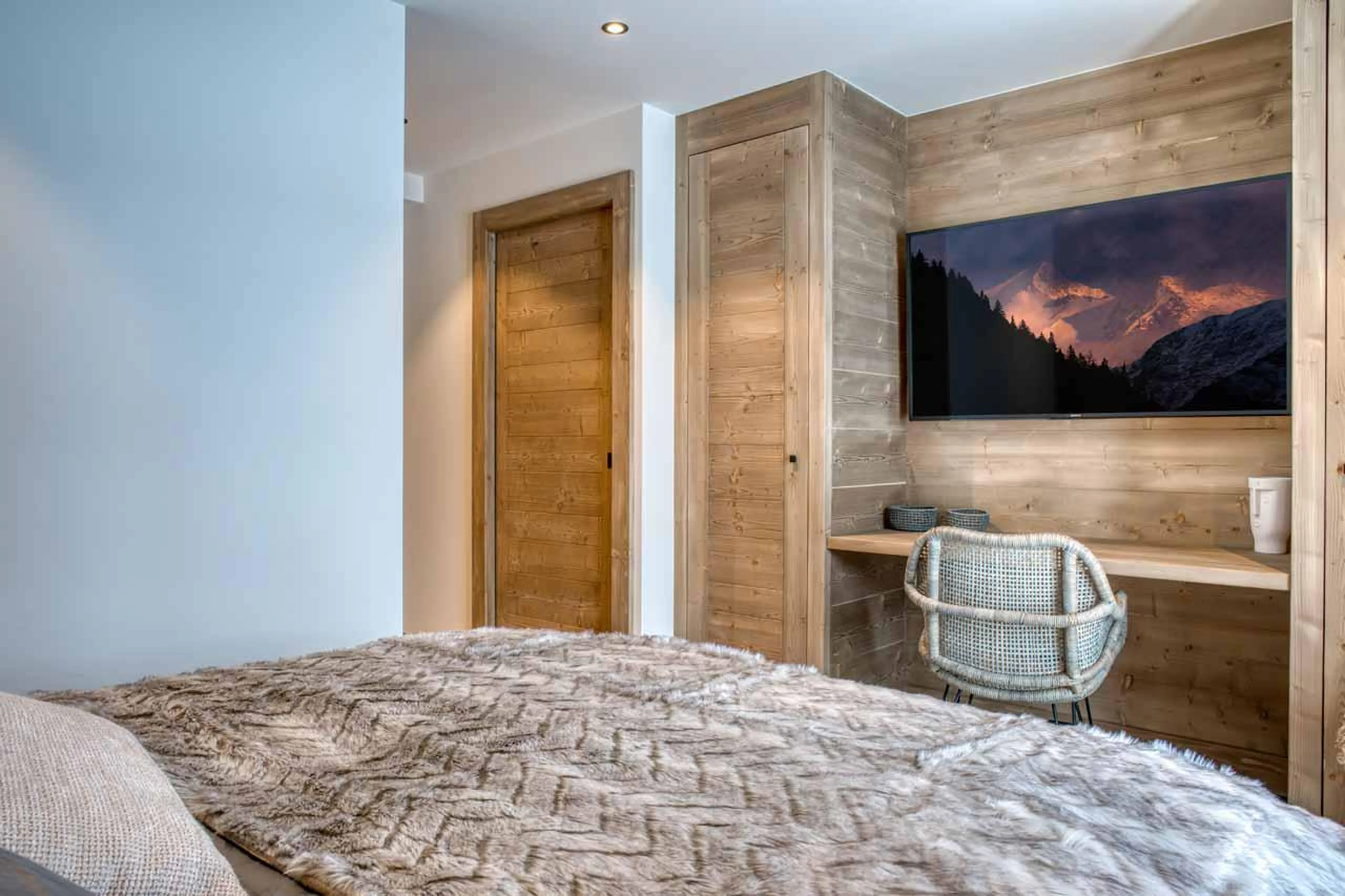 TV in bedroom two at Apartment Tourmaline in Megeve