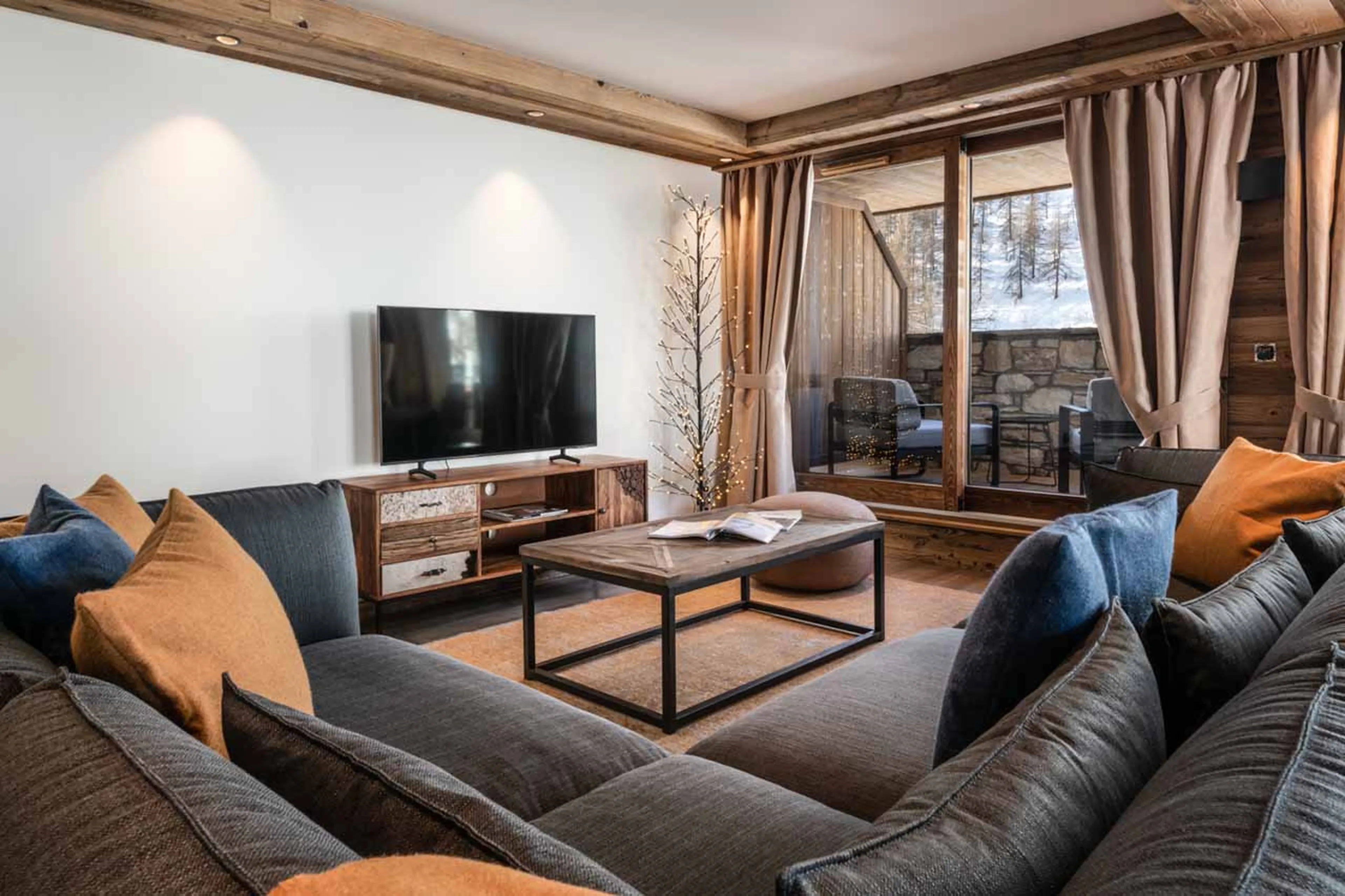 Living area TV at Apartment Vail Lodge B31 in Val d'Isere