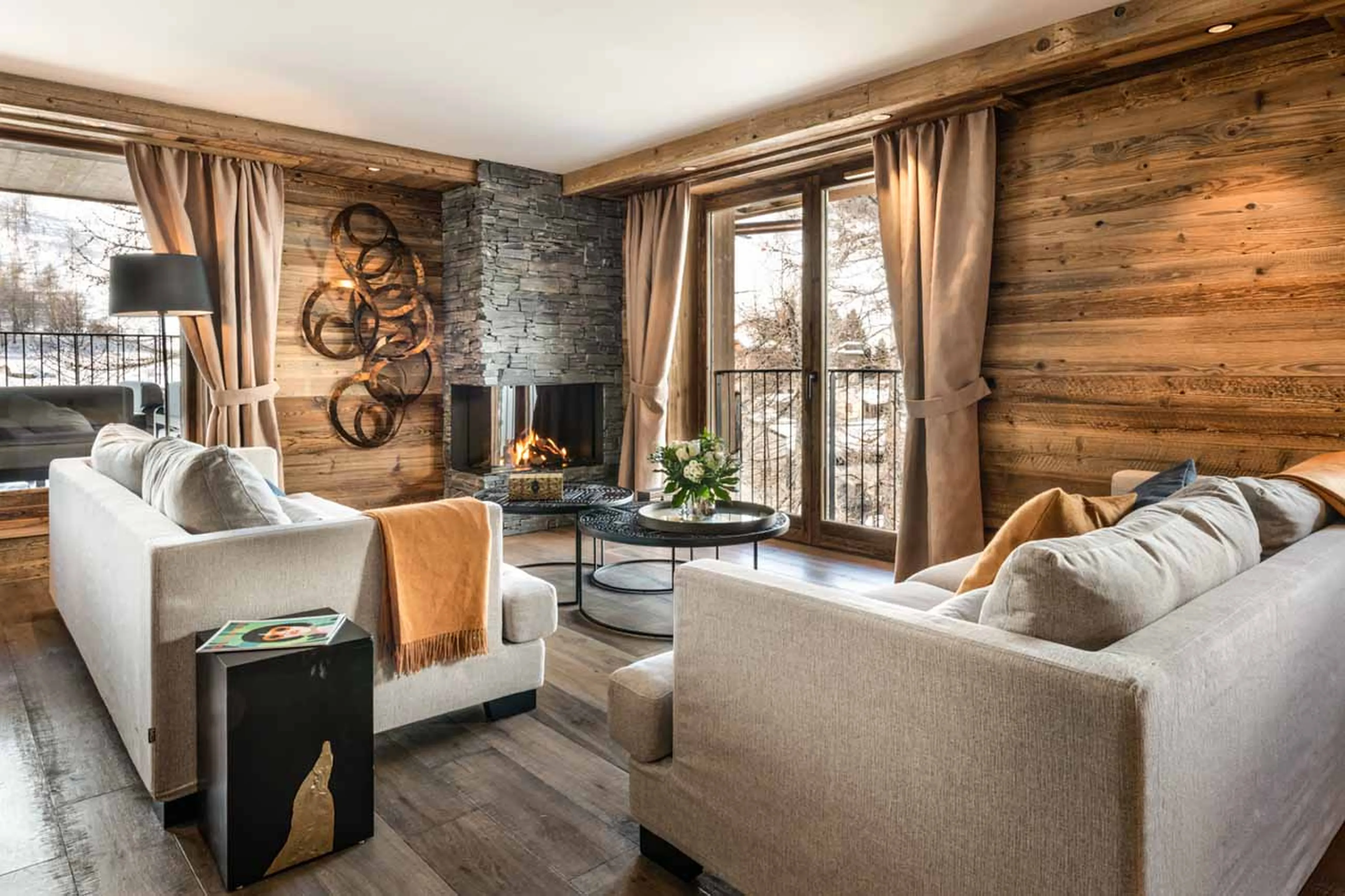 Living area fireplace at Apartment Vail Lodge B31 in Val d'Isere