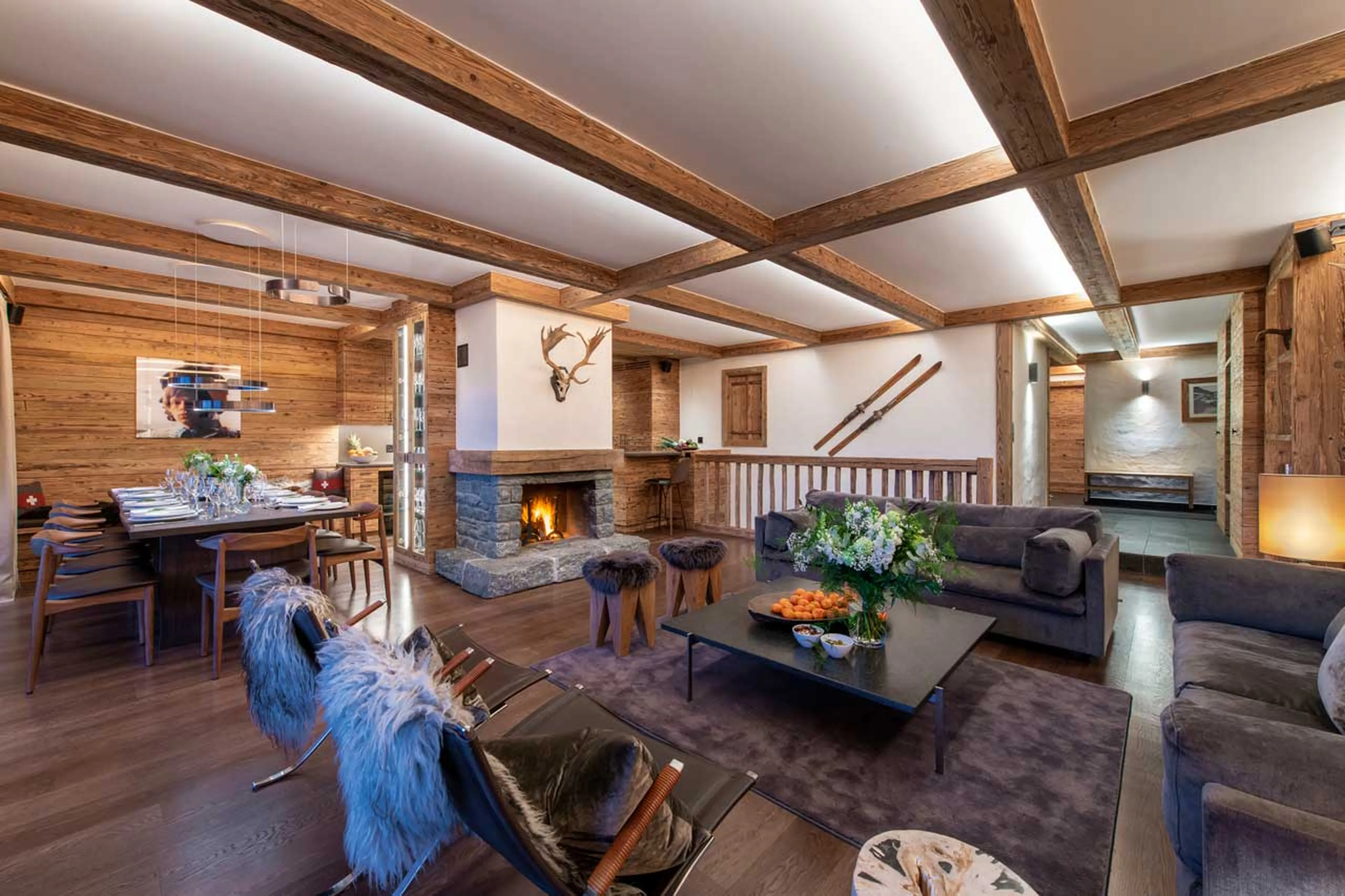 Open plan living and dining area at Apartment Victoria 111 in Verbier