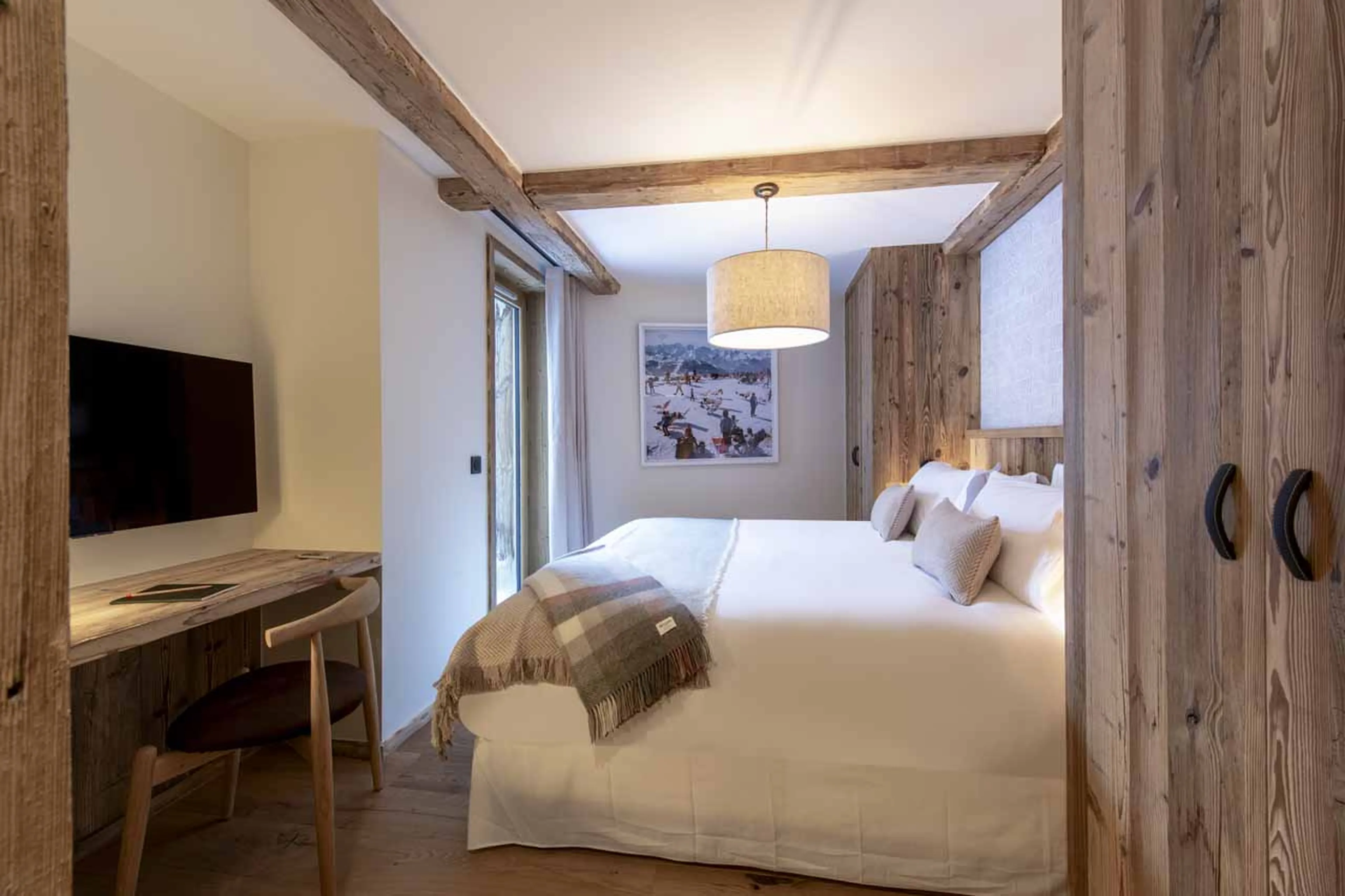 TV and access to balcony from bedroom 4 at Arolay Apartment 2 in Val d'Isere