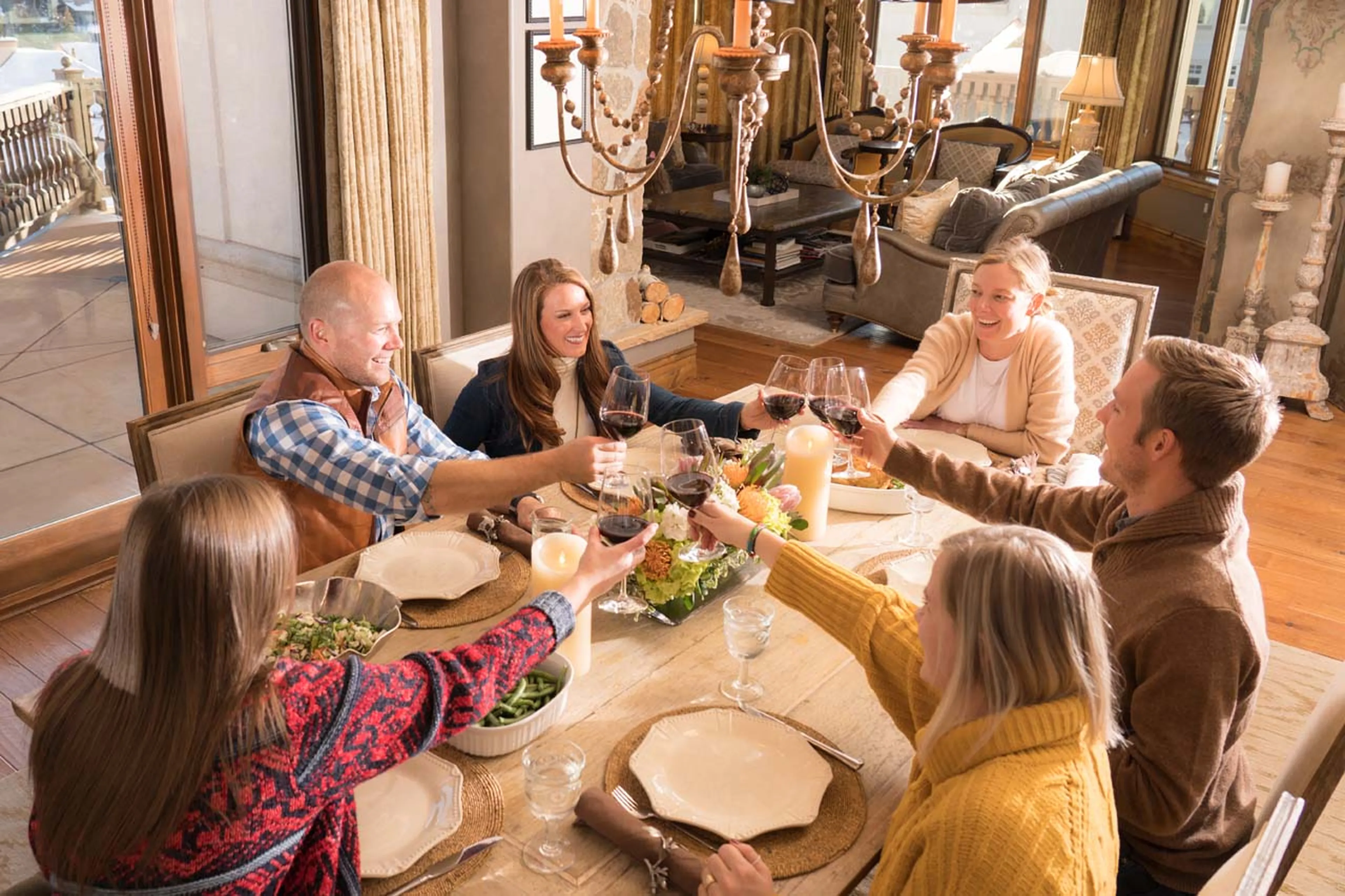 Enjoying a meal around the dining table at Arrabelle Chalet in Vail