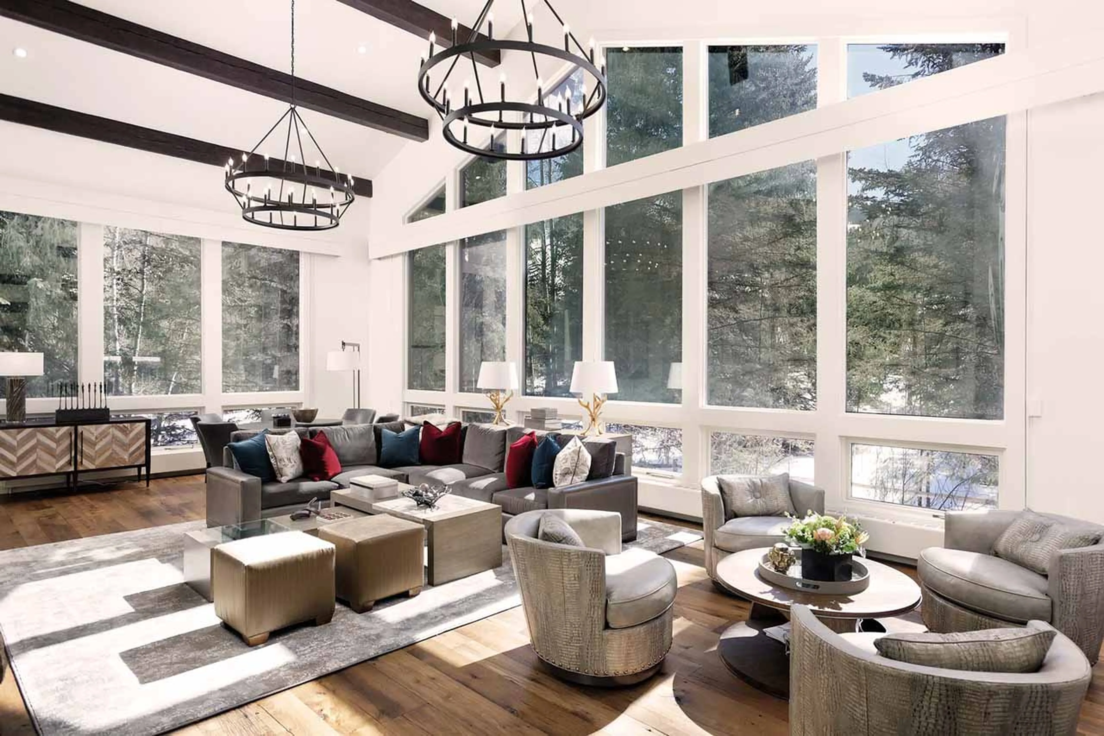 Floor to ceiling windows in living room of Avanti Chalet in Vail