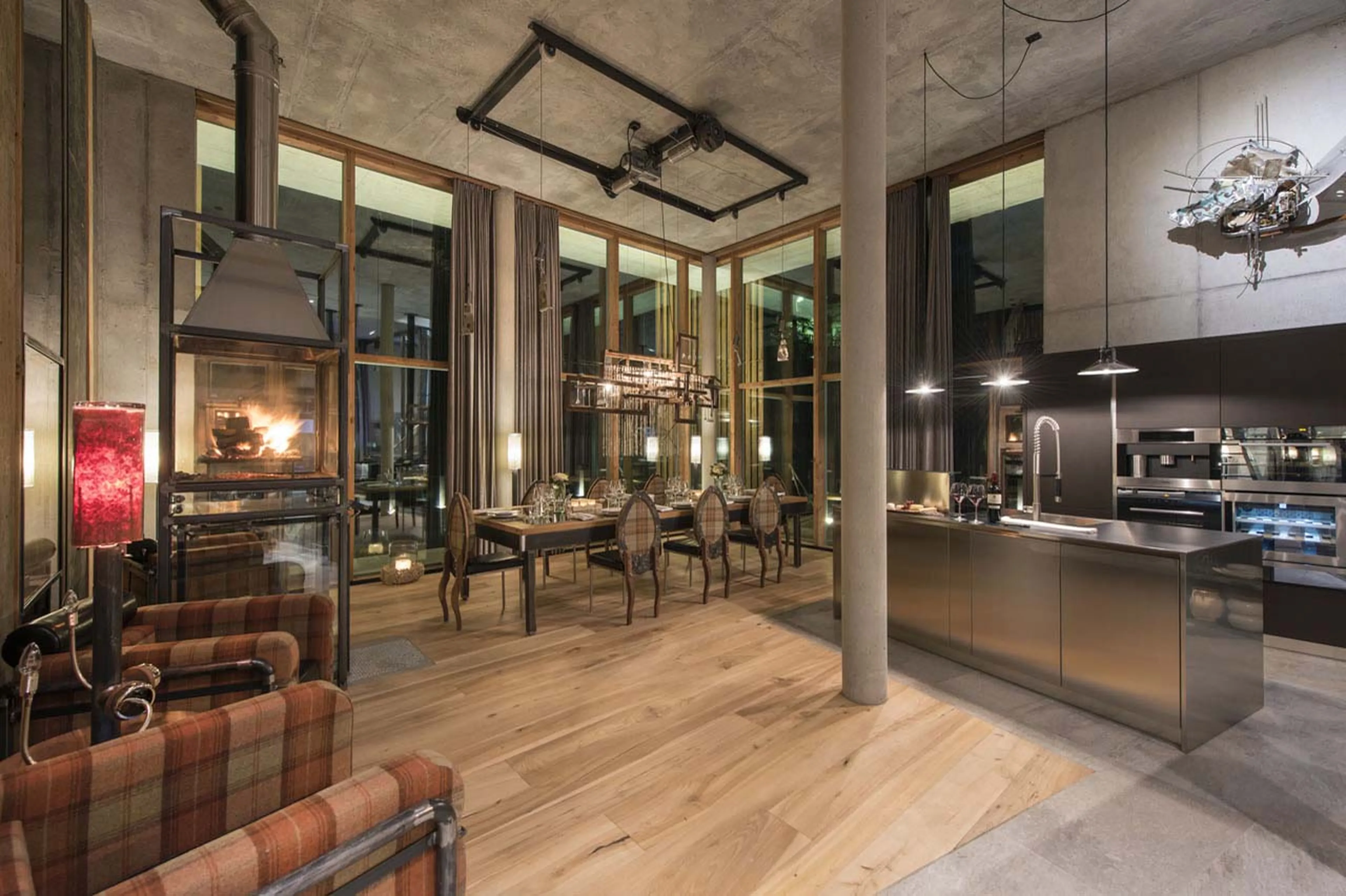 Open plan dining area and kitchen at Backstage Luxury Loft in Zermatt
