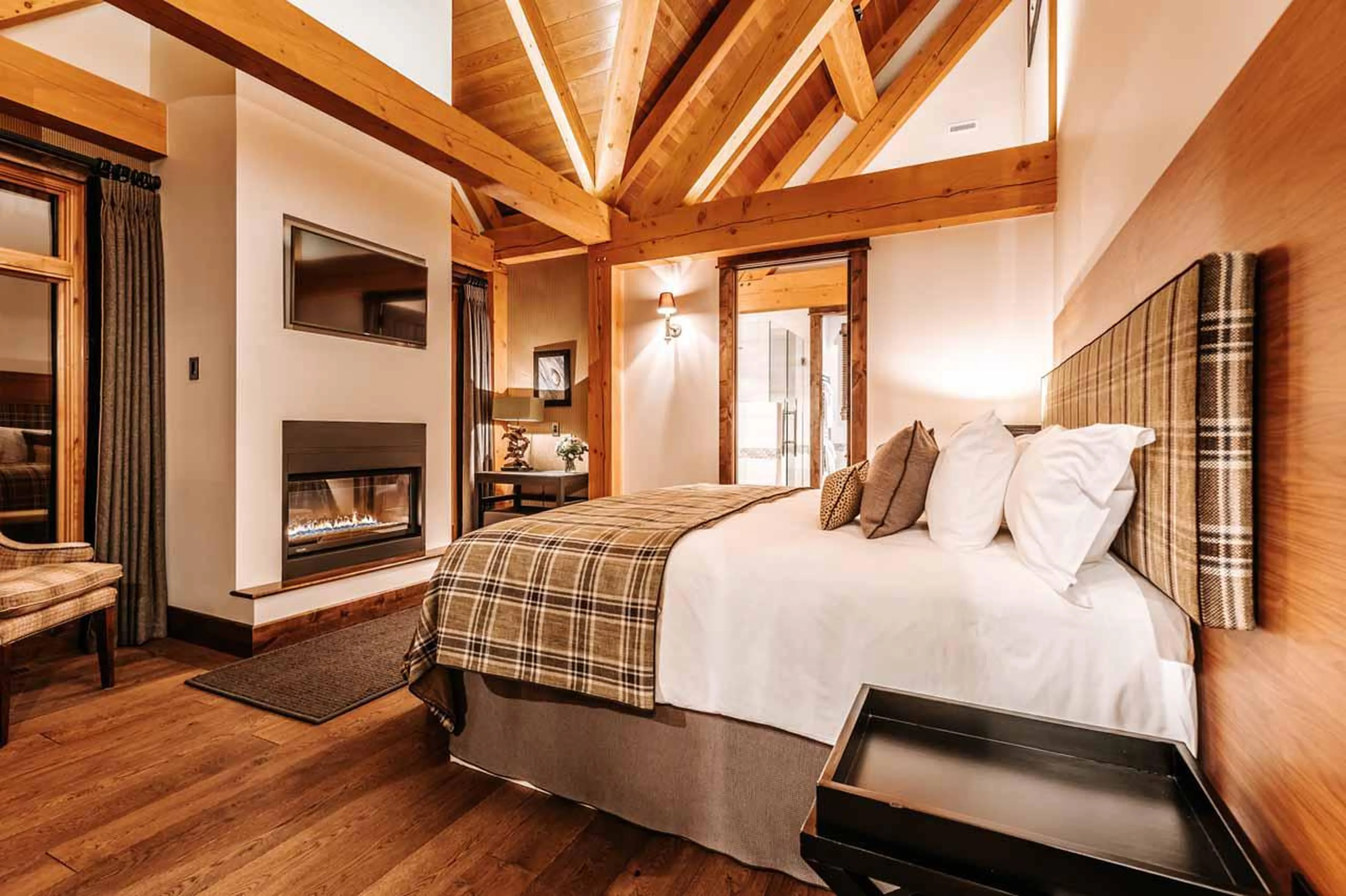 Fireplace in bedroom six at Bighorn in Revelstoke