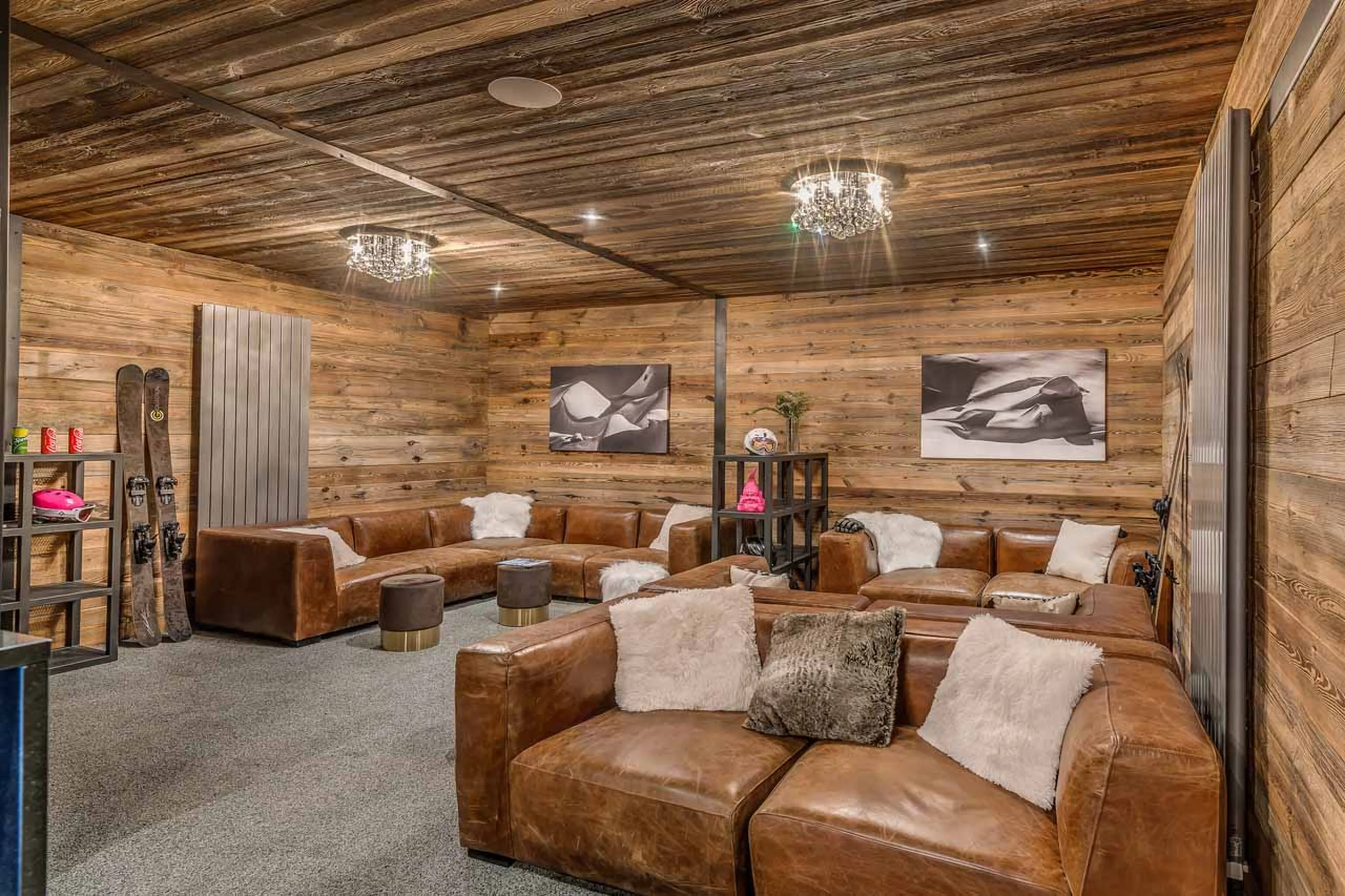 Sofas in ski lounge at Chalet Tango in Tignes