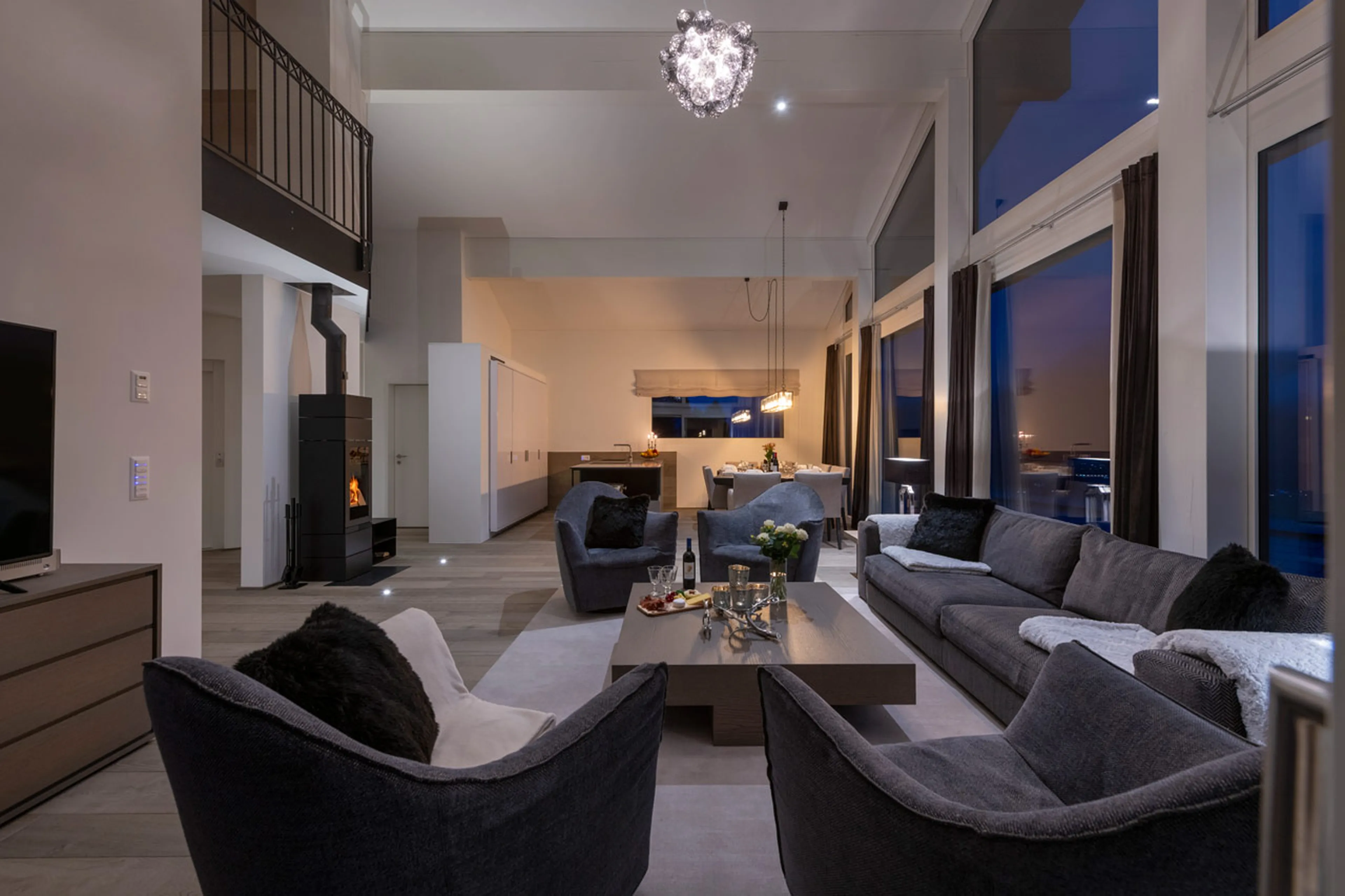 Open-plan living and dining area at Seehorn at Bortji Estate in Davos