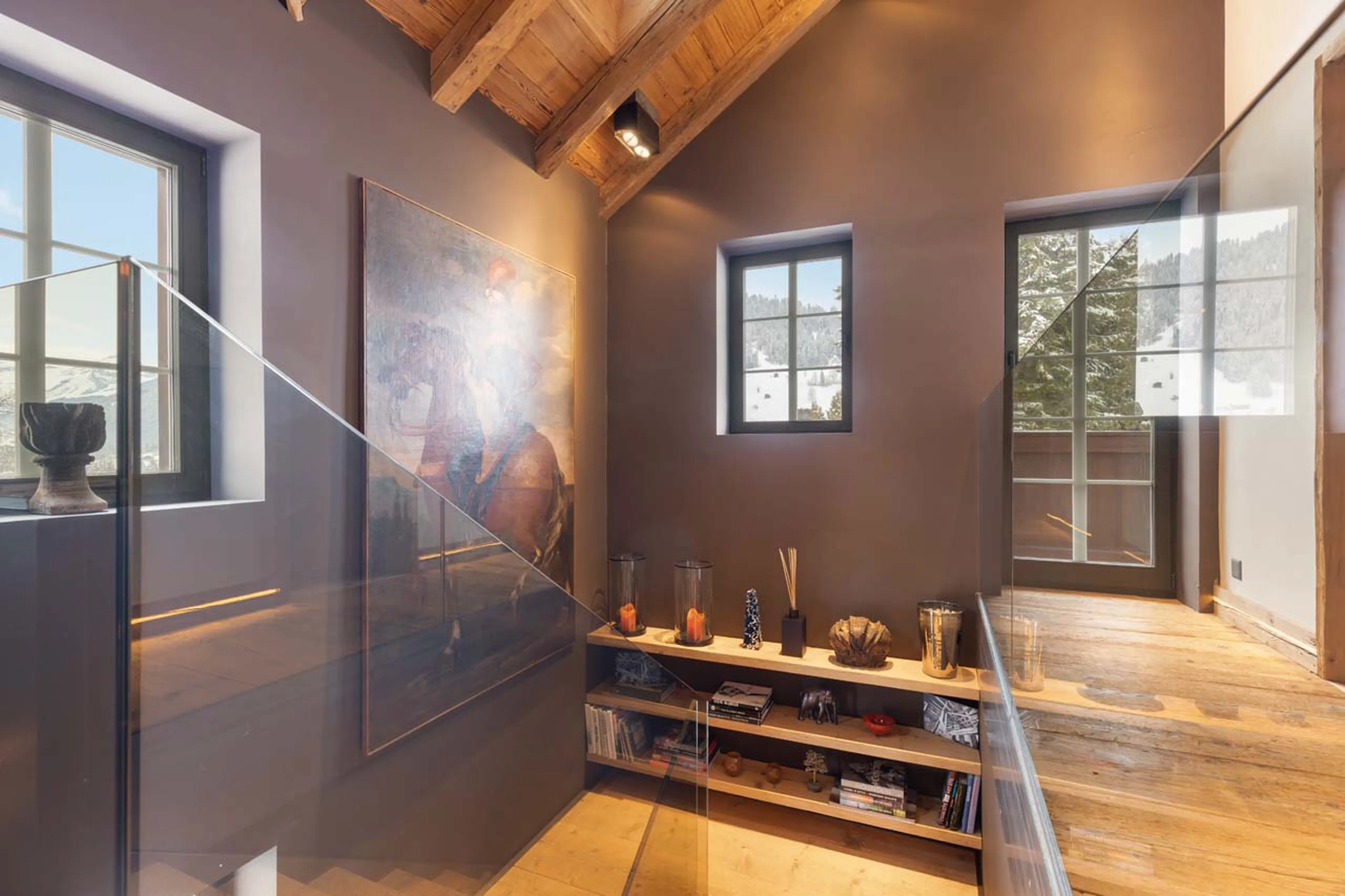 Staircase to living area at Casa Promenade in Gstaad