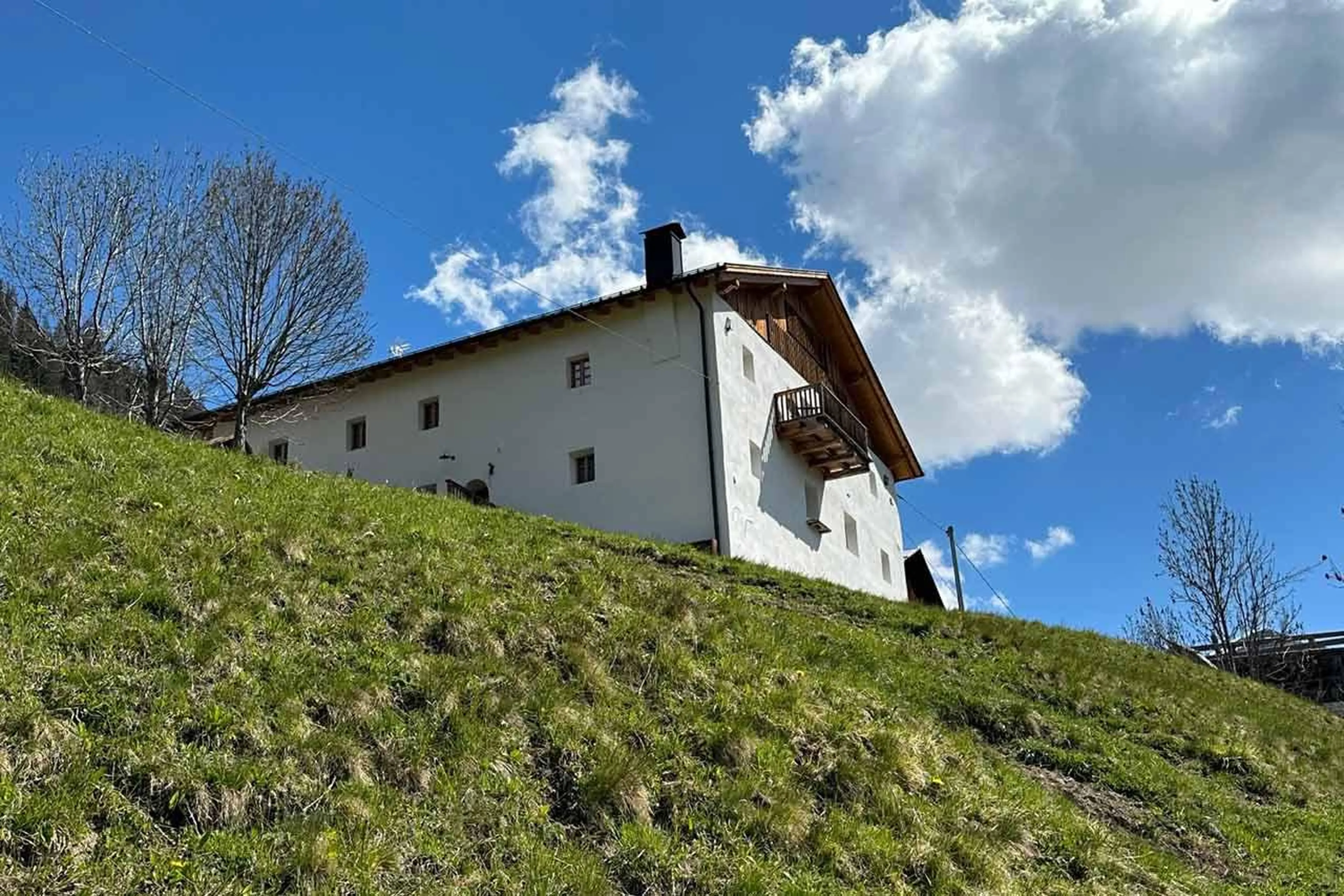 Summer setting of Casa Tra Cime in Arabba