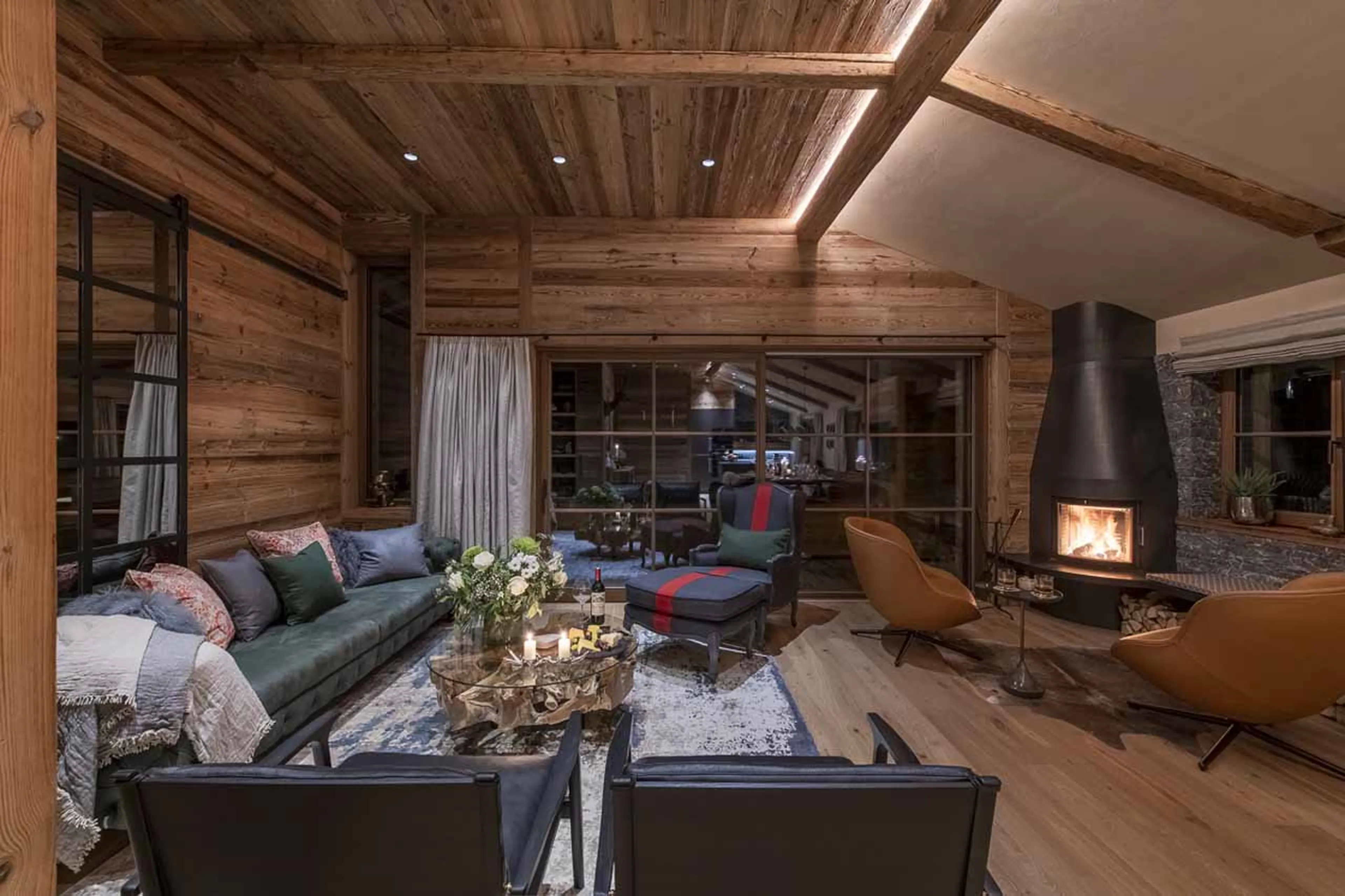 Living area with fireplace at Chalech 4 in Lech