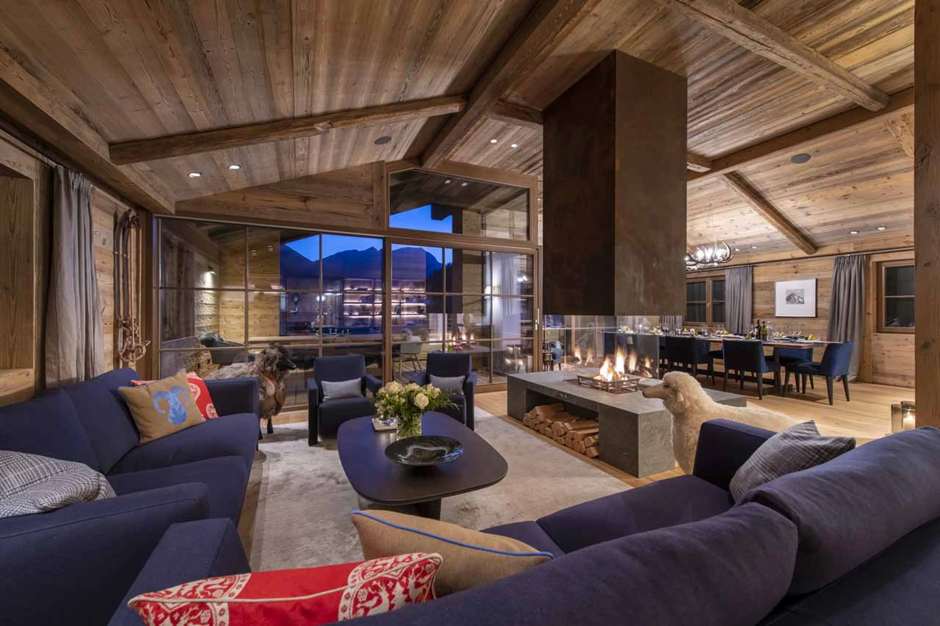 Central fireplace in living room at Chalech S in Lech