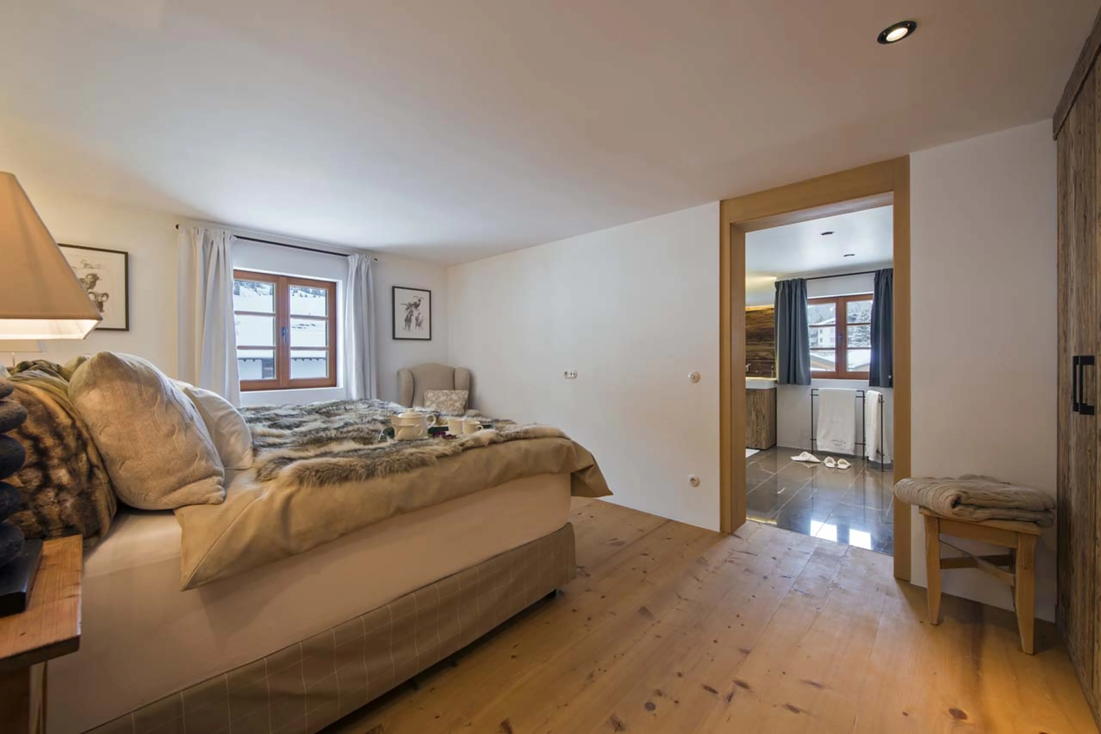 Chalet 1597 in Lech has an emperor bedroom suite with lounge area