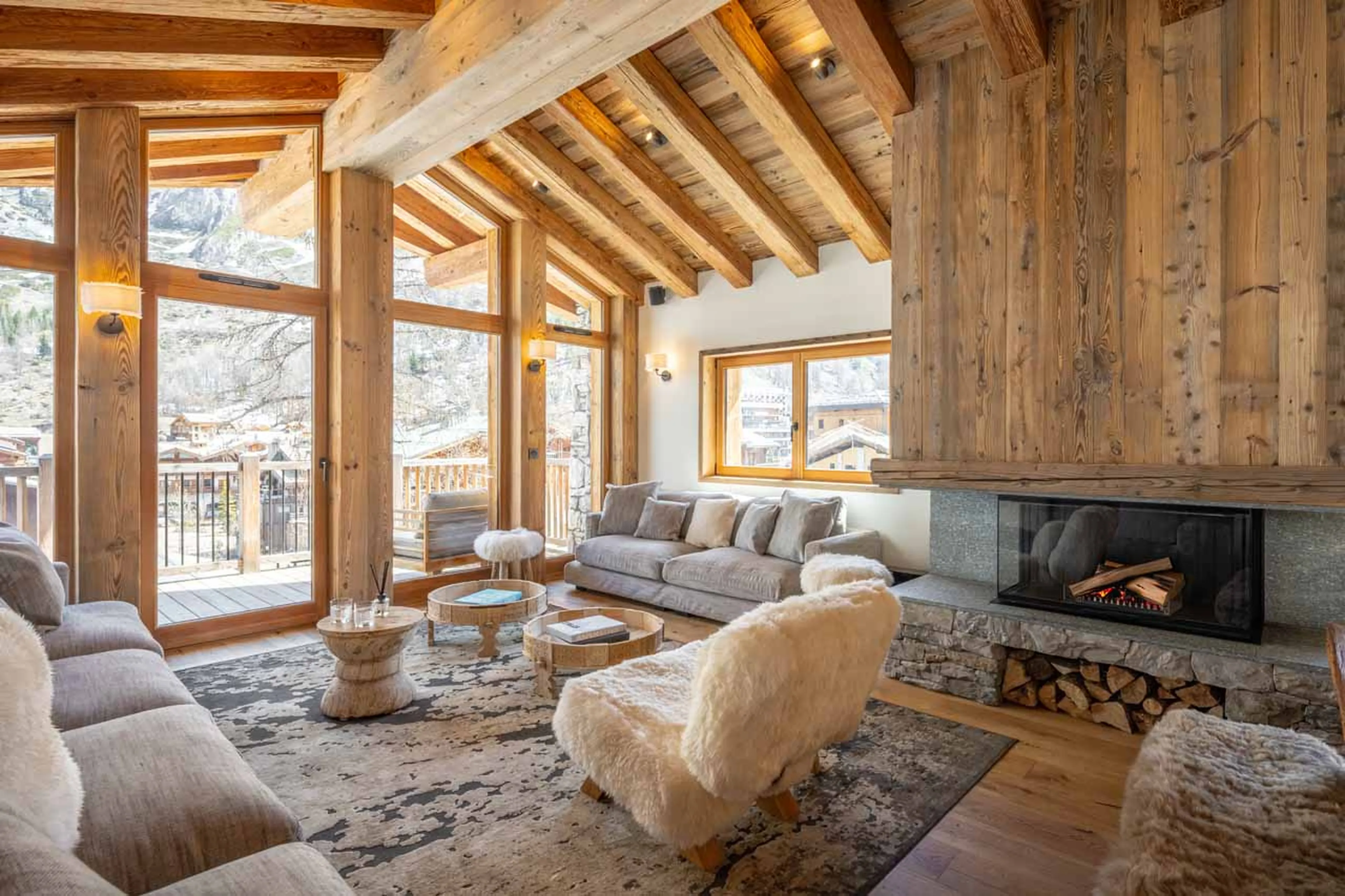 Open-plan living area flooded with natural light at Chalet 1855 in Val d'Isere