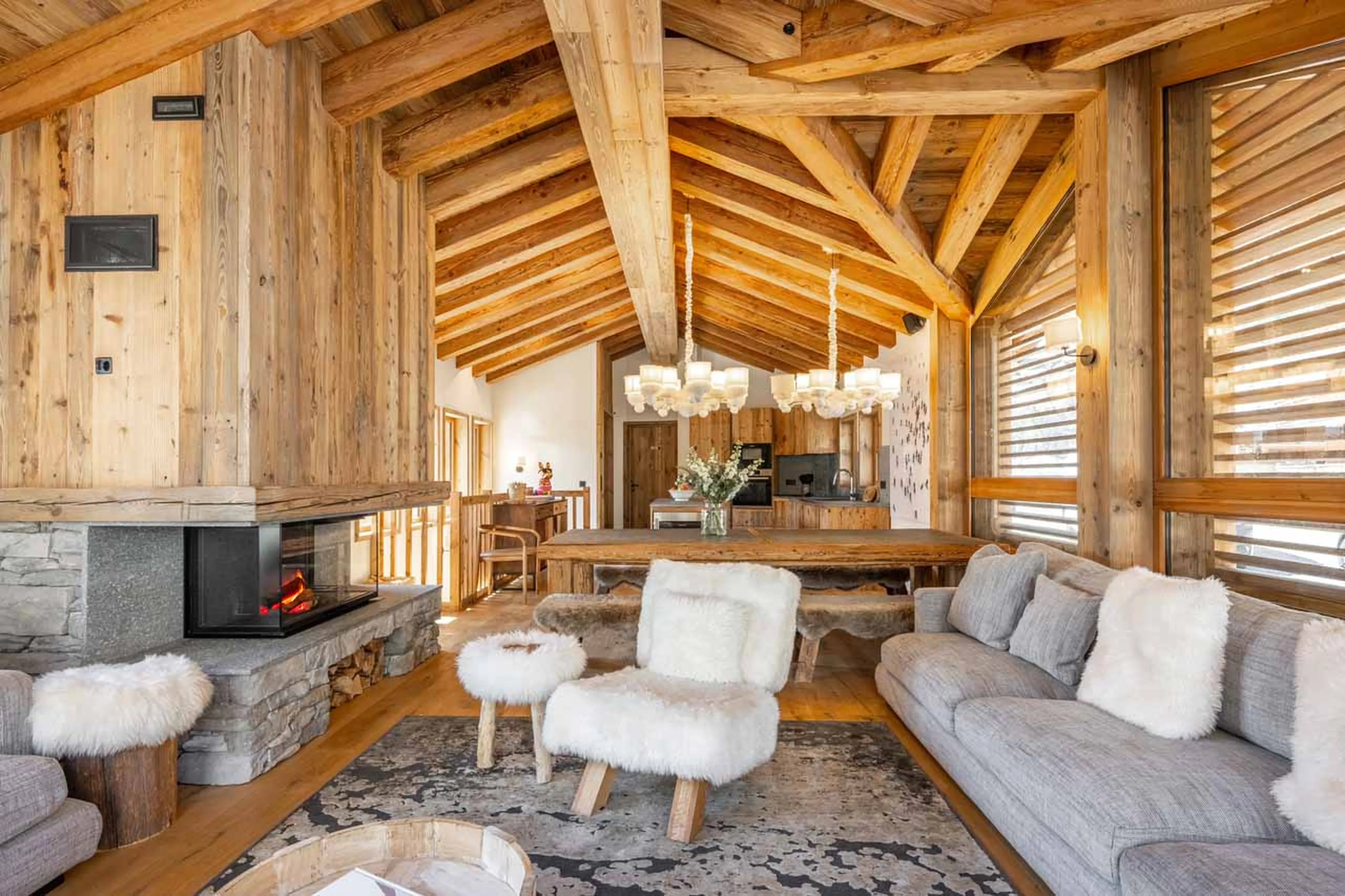 Open-plan living area at Chalet 1855 in Val d'Isere