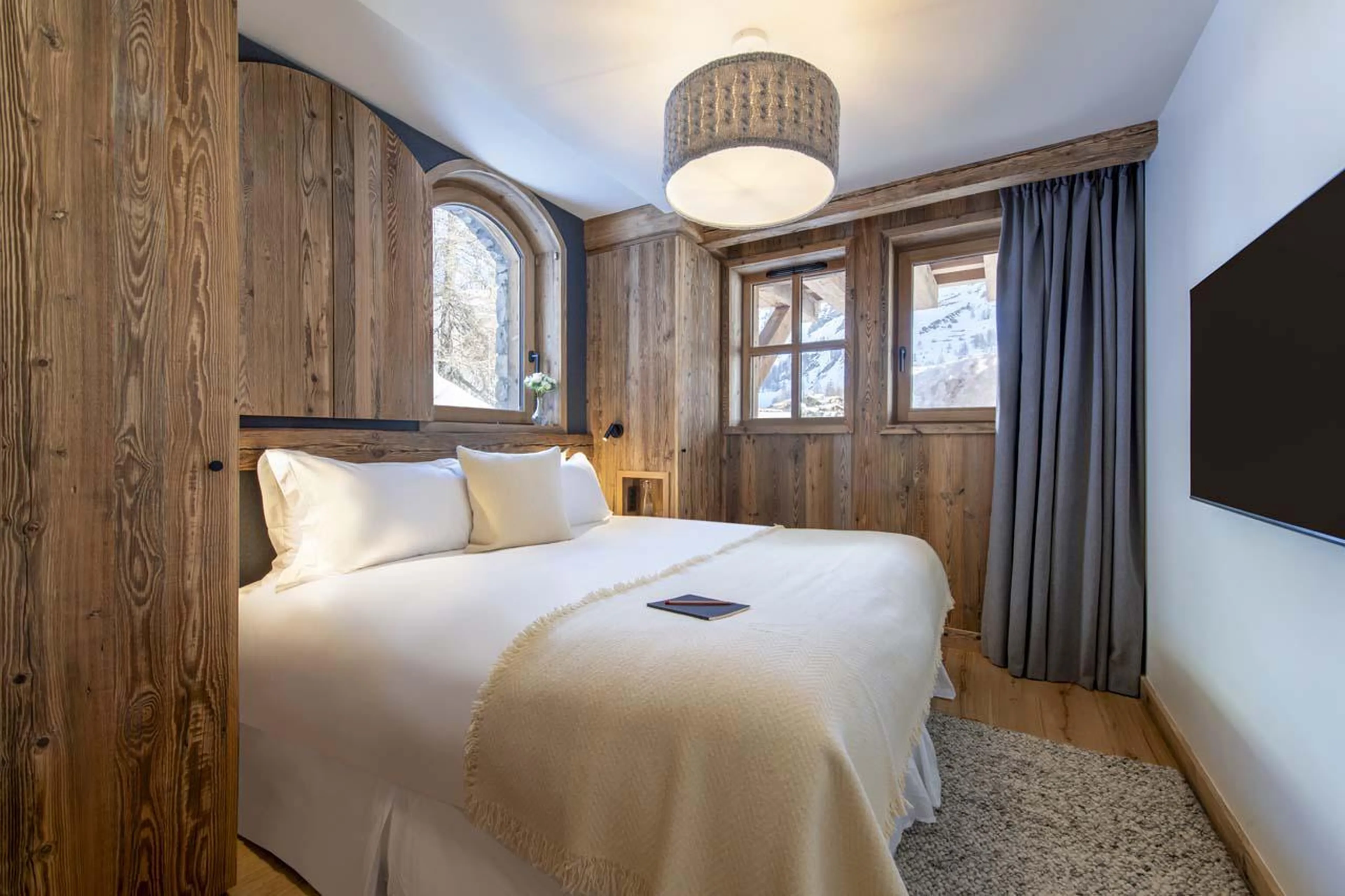 Elegant double bedroom at Chalet 1855 in Val d'Isere
