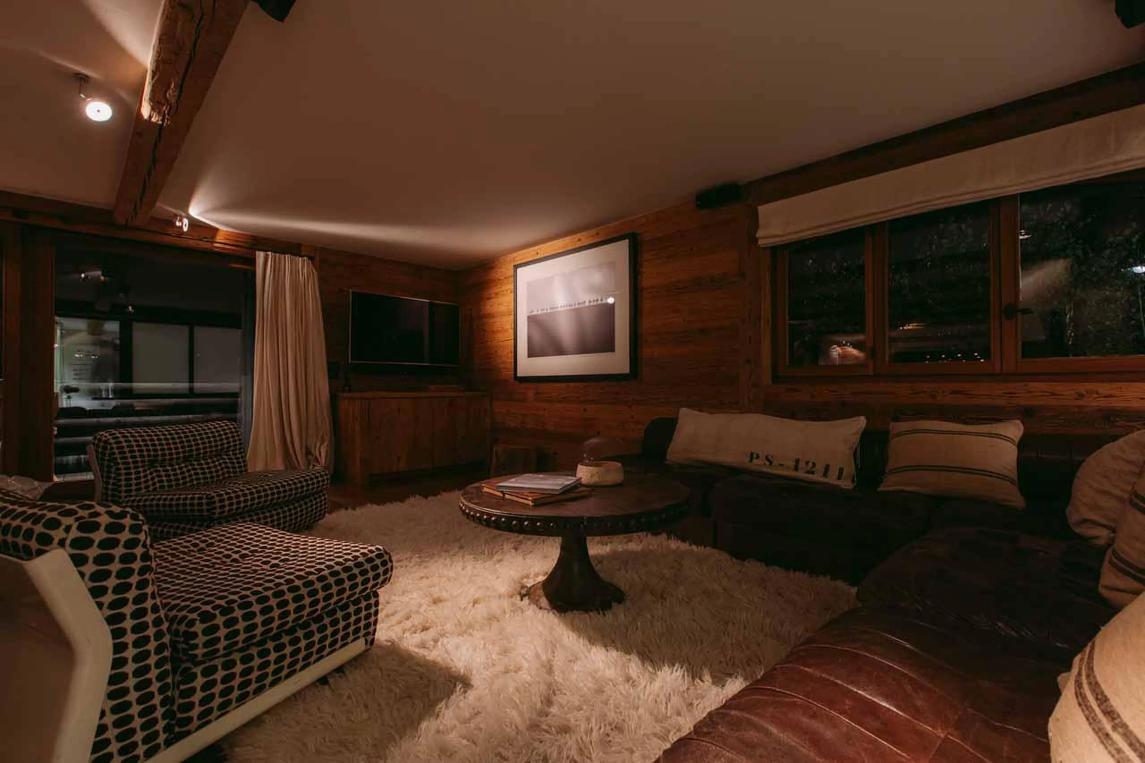 TV area in living room of Chalet 1936 in Verbier