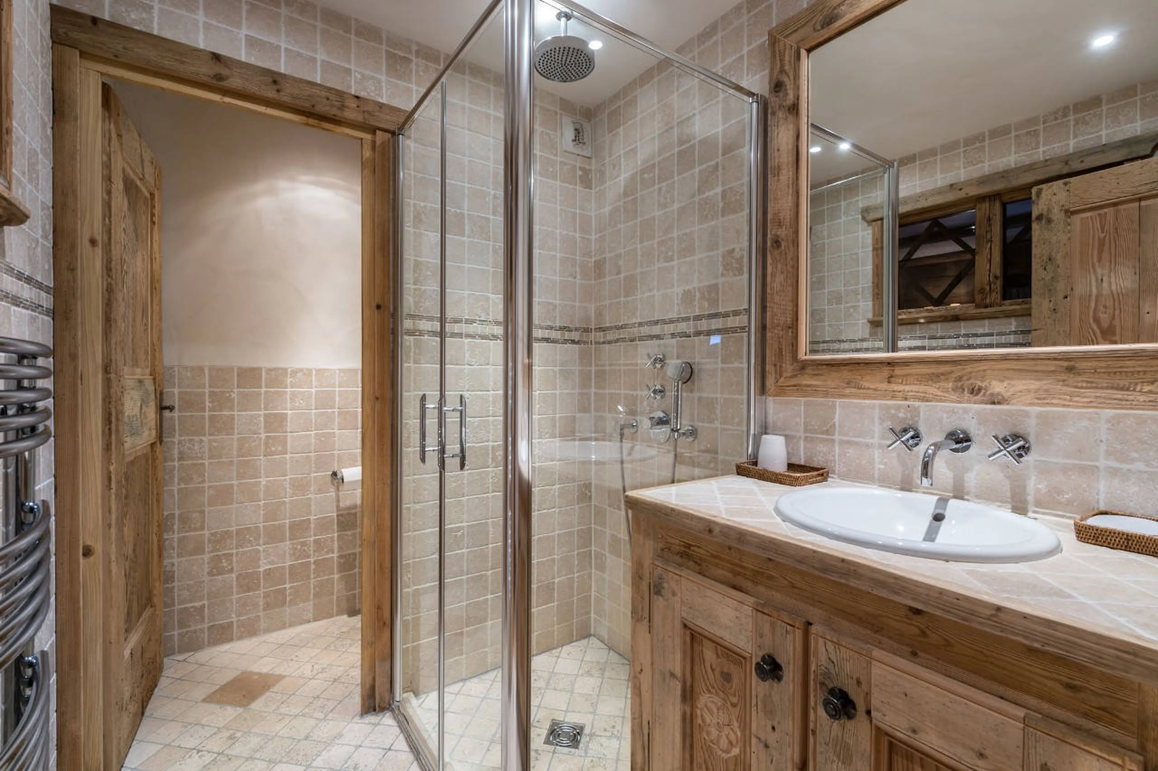 En suite shower room to double bedroom in Chalet 3 Soeurs in Courchevel 1850