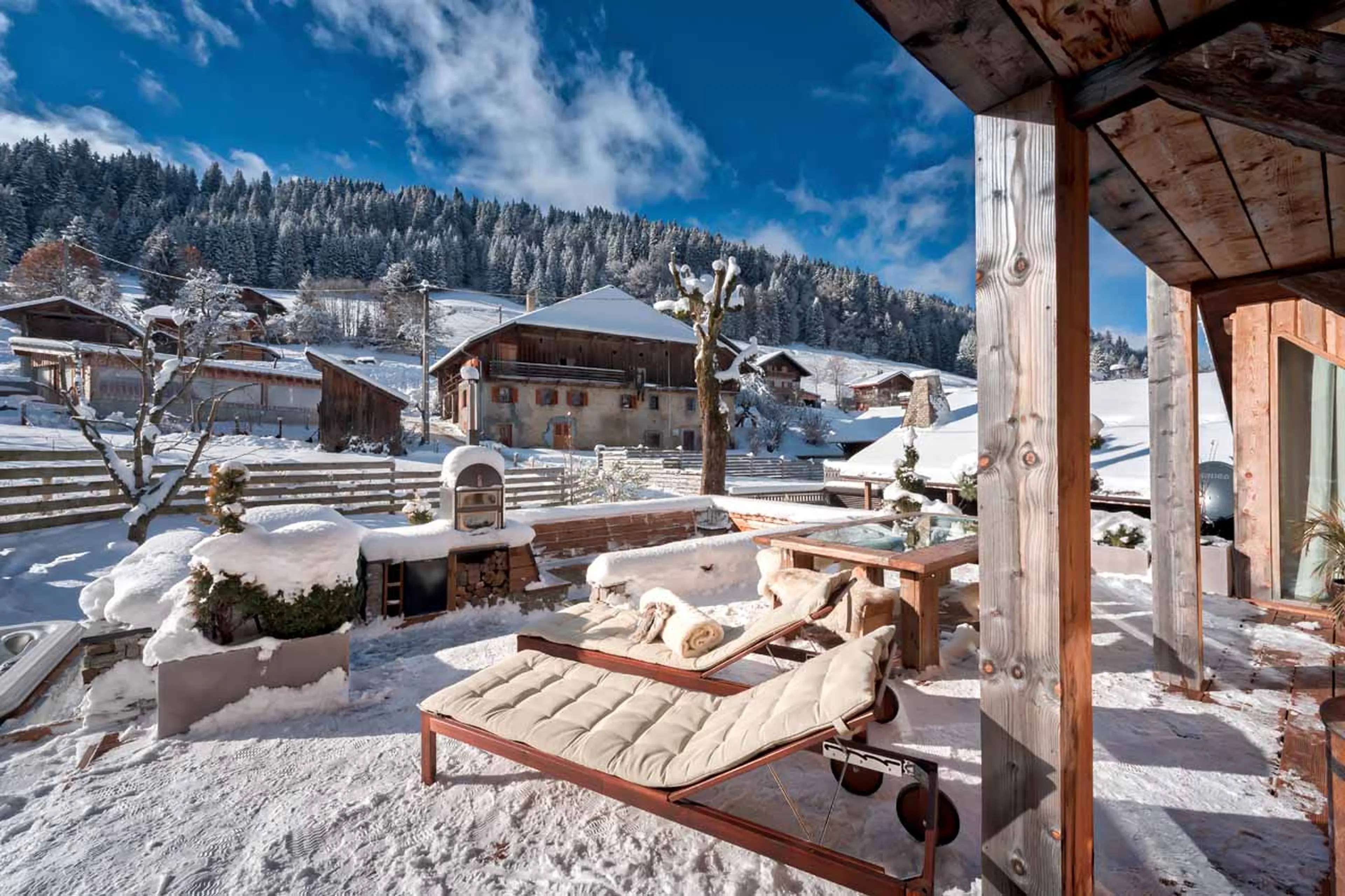 Sun loungers on terrace at Chalet 46˚ in Morzine