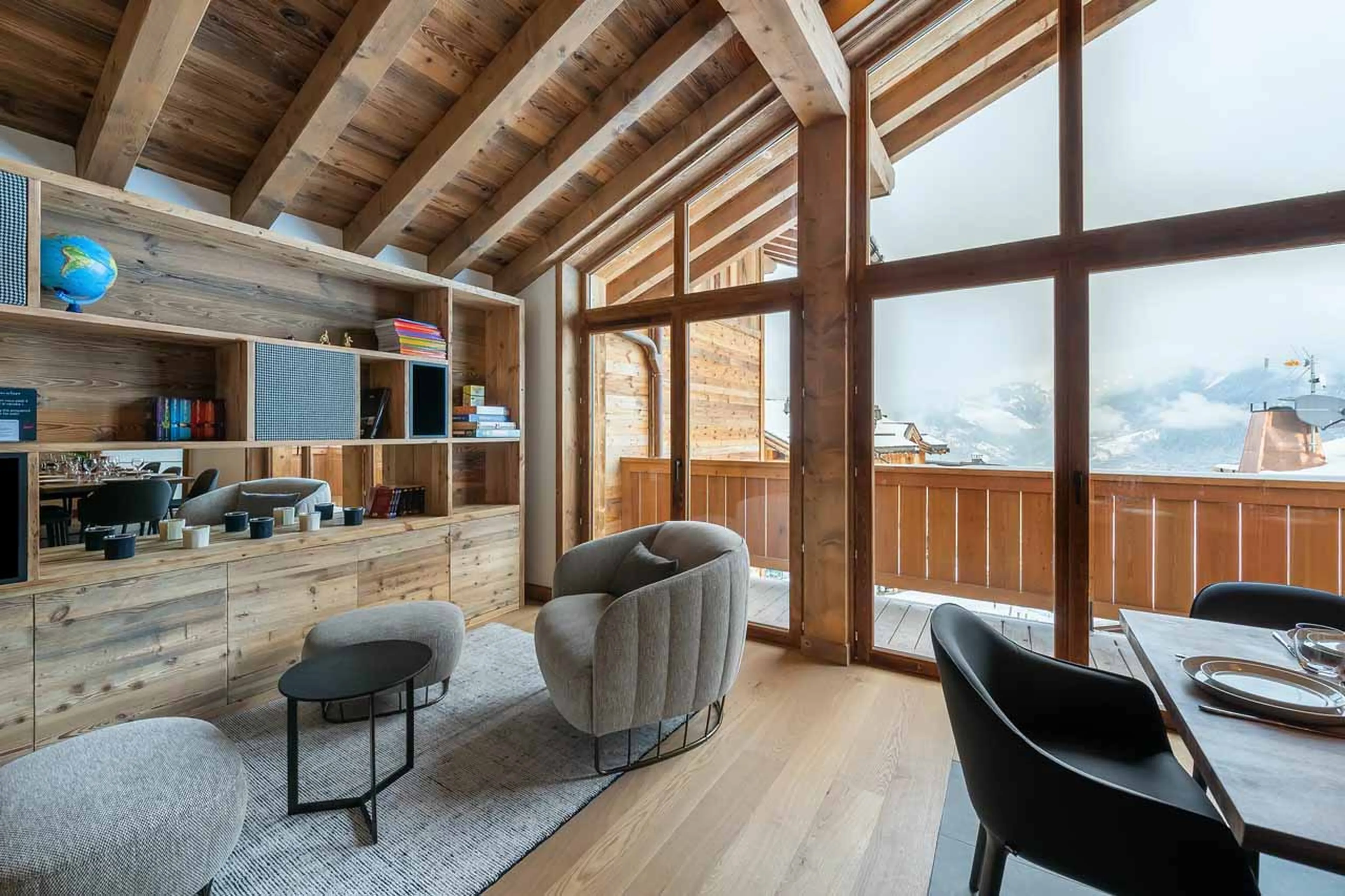 Access to terrace from living area at Chalet CIUK in Courchevel 1550