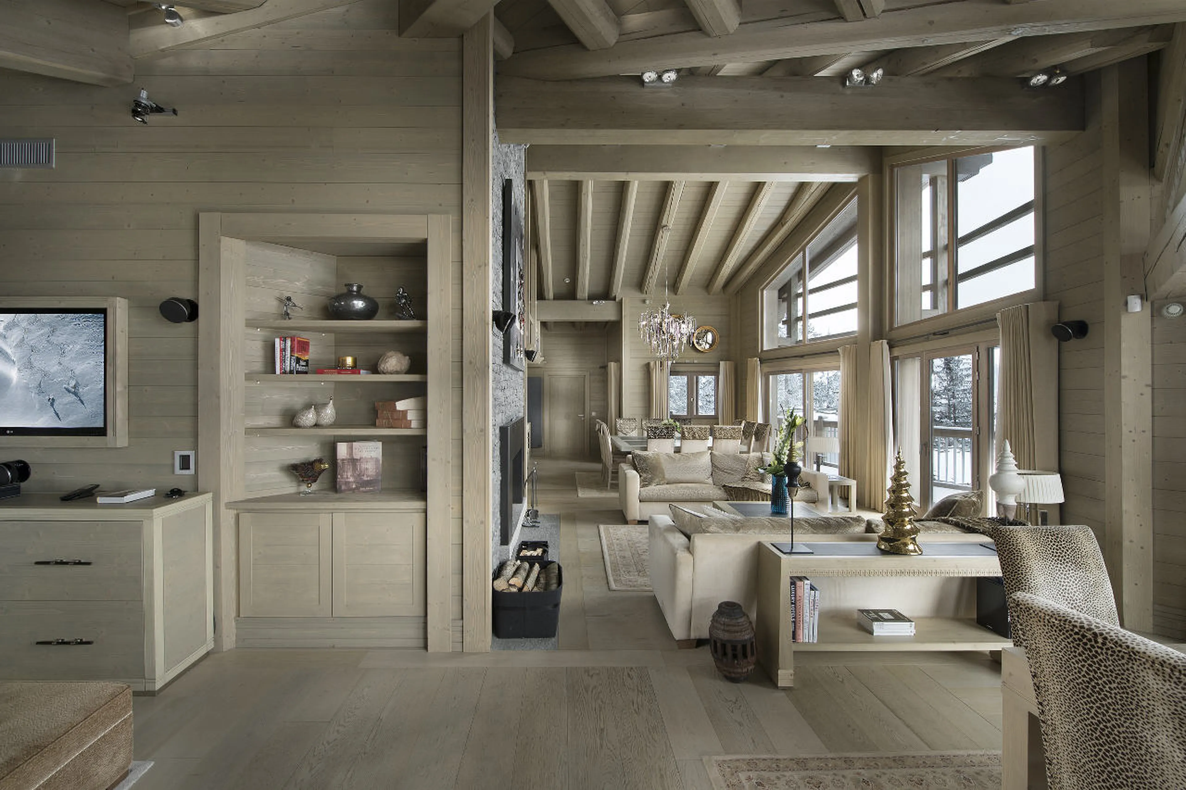 TV and lounge area with picture windows in Chalet Abruzzes in Courchevel 1850