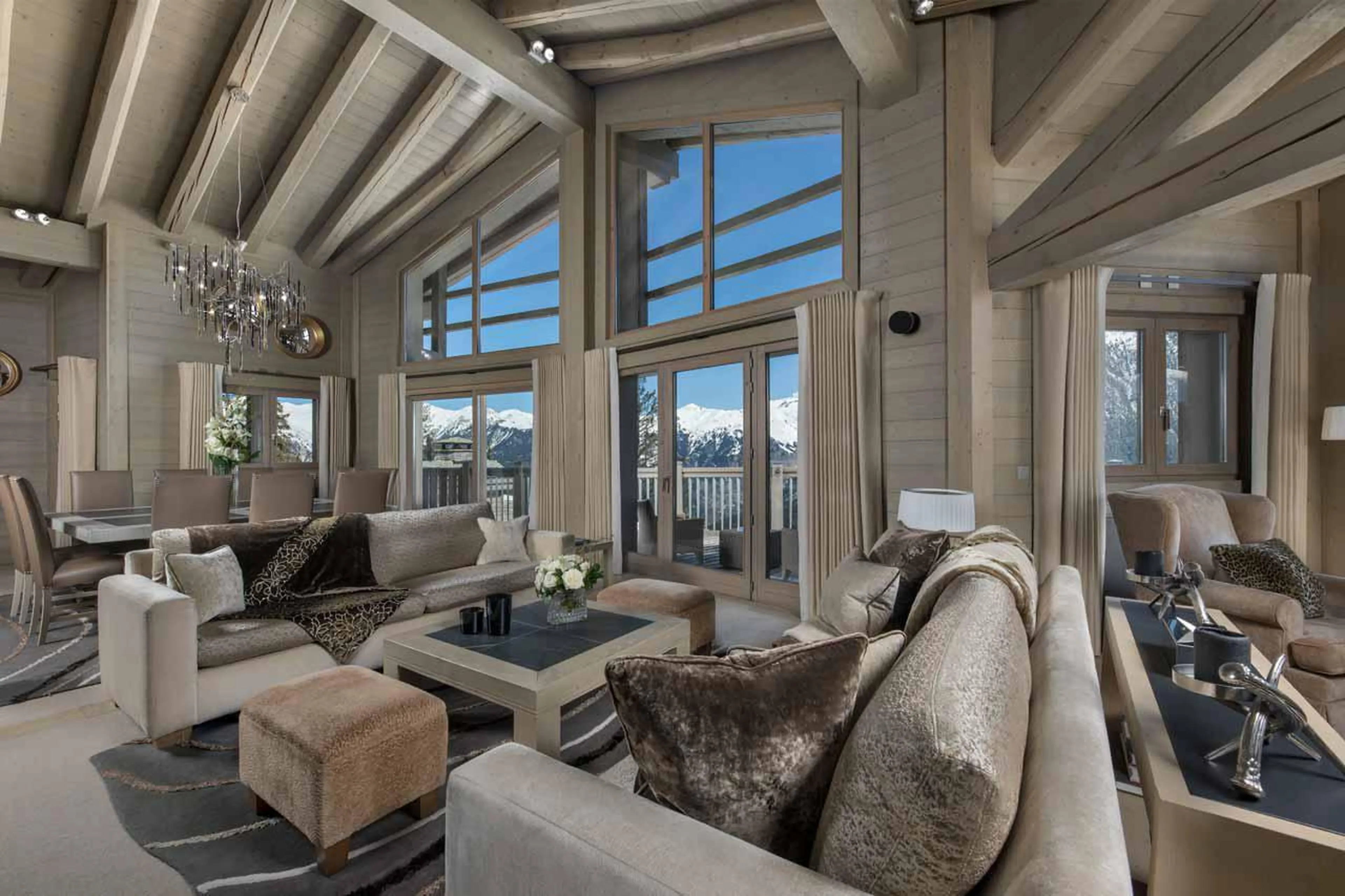 Open-plan living area at Chalet Abruzzes in Courchevel 1850