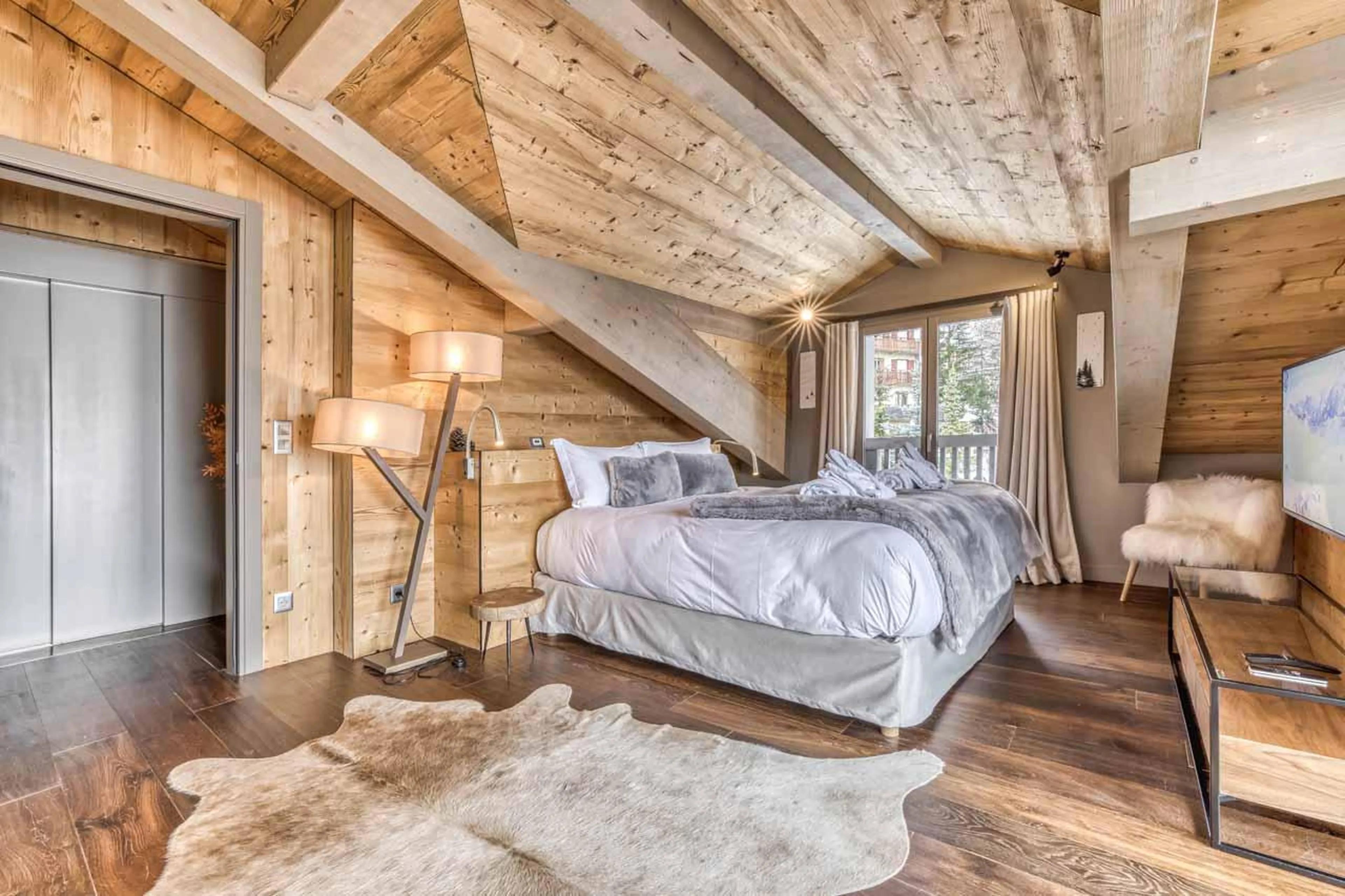Spacious master bedroom at Chalet Acelia in Courchevel 1550