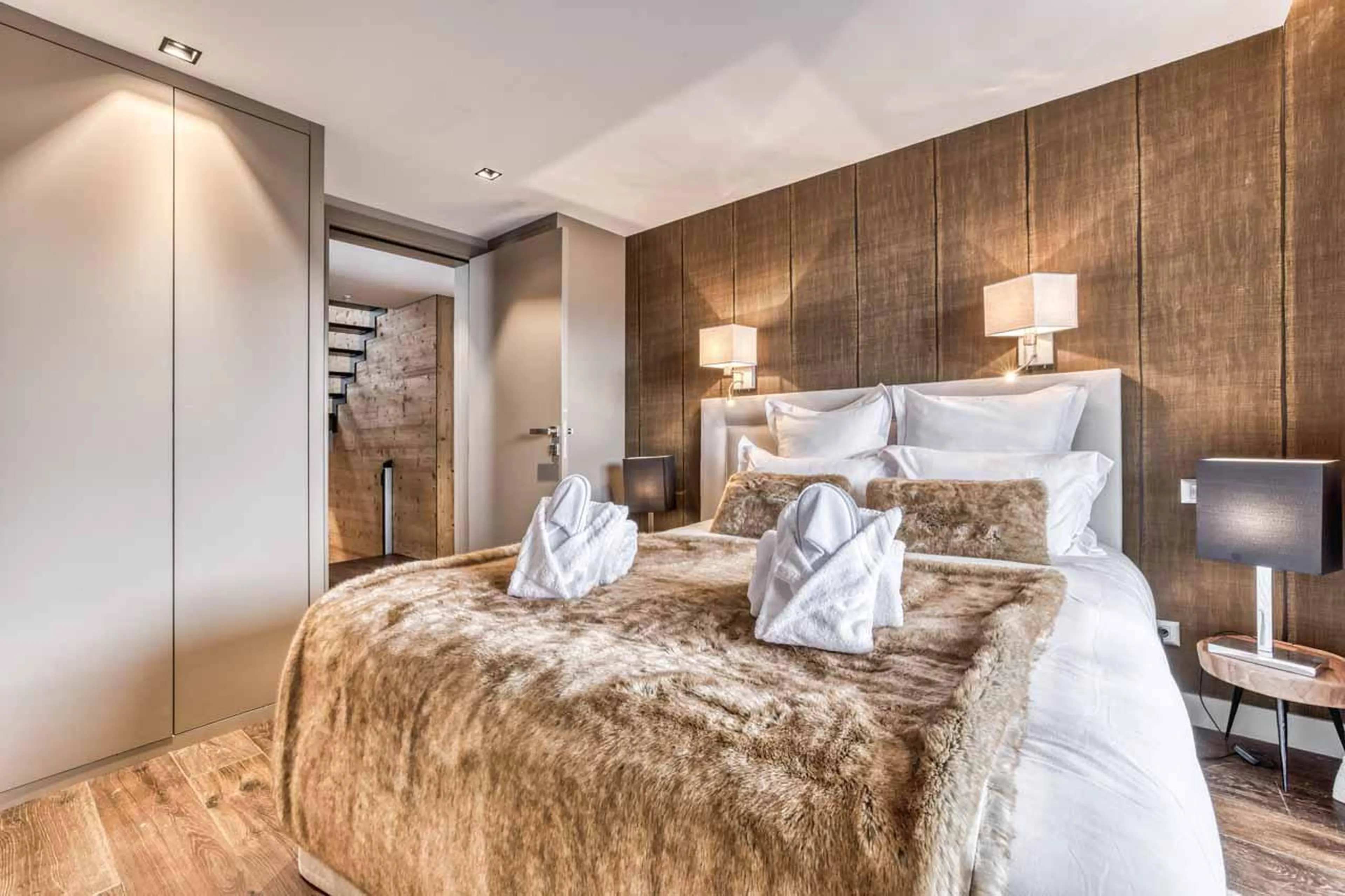 Double bedroom with generous storage space at Chalet Acelia in Courchevel 1550