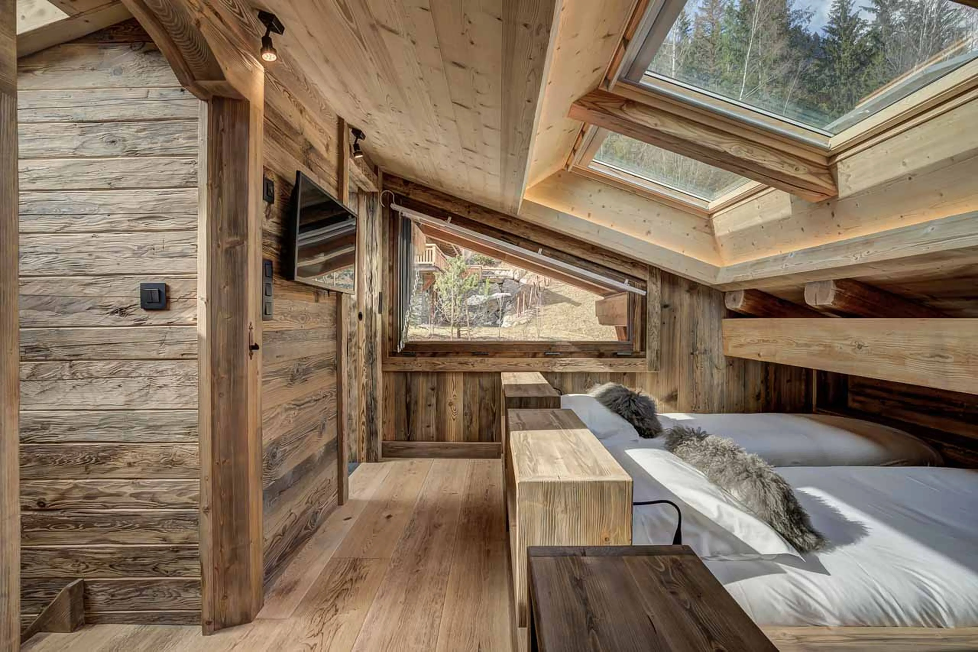 Beds under skylight at Chalet Alaska in Chamonix