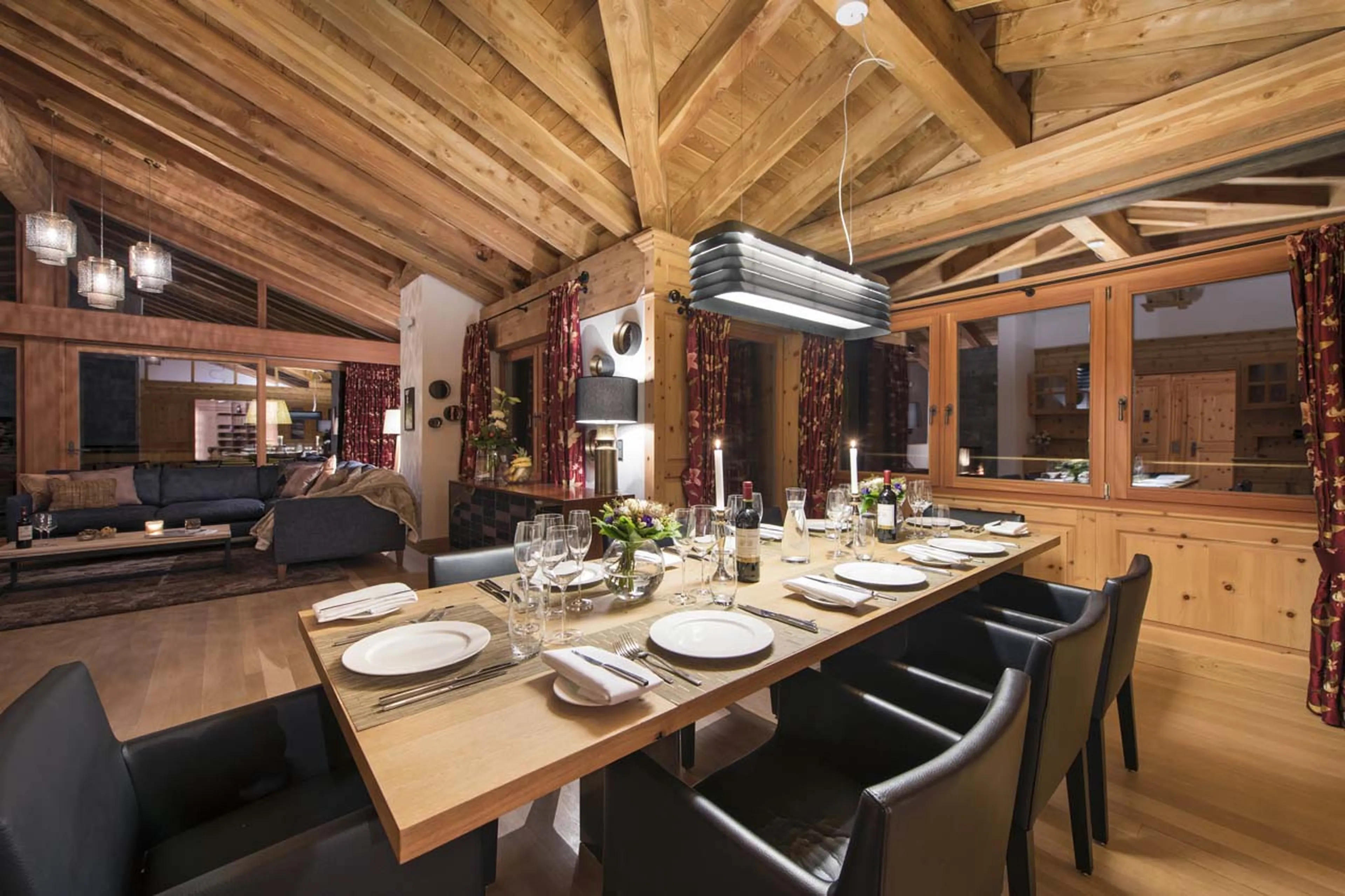 Dining area at night of Chalet Alex in Zermatt