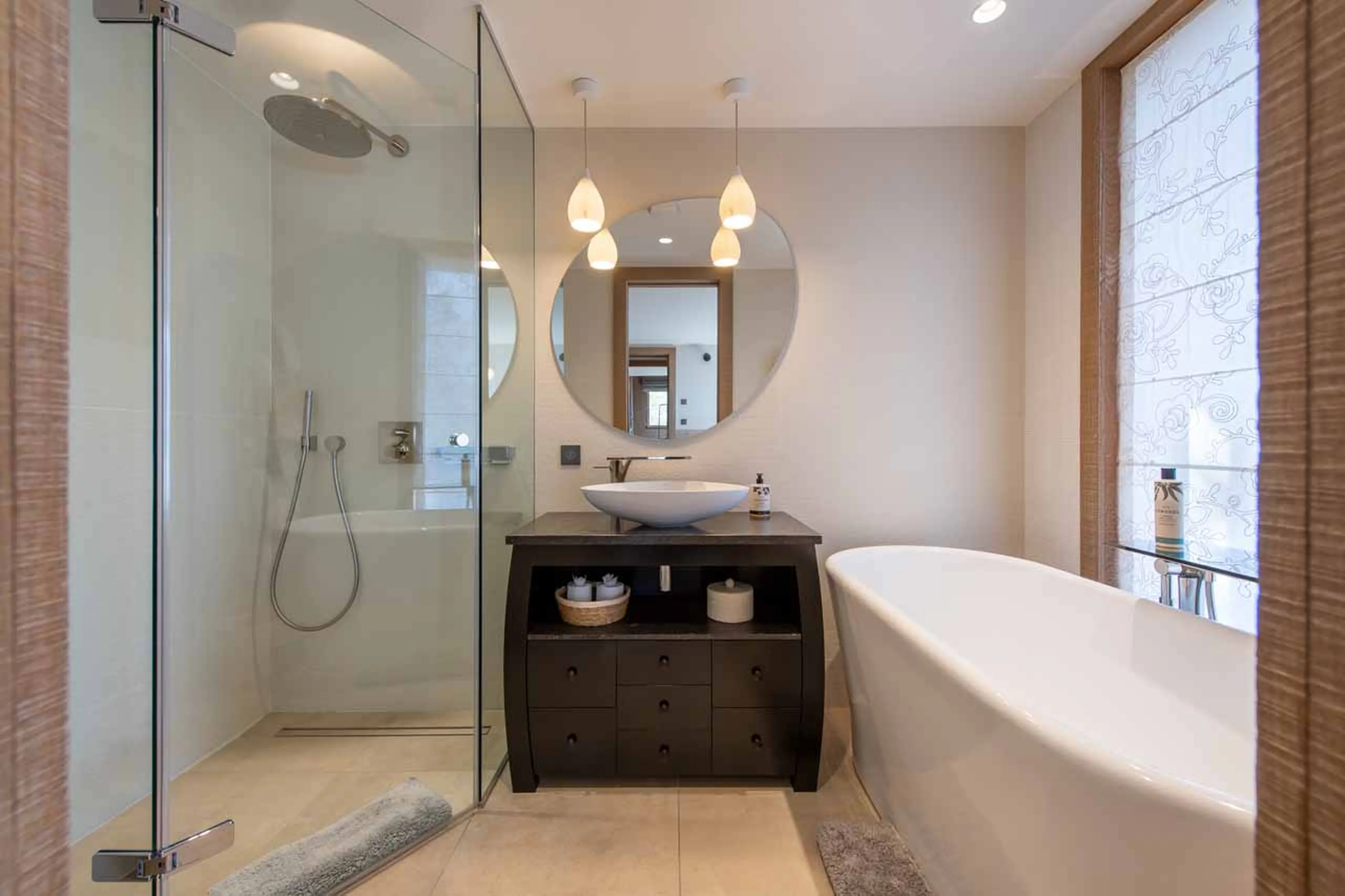 Bedroom five balcony and bathroom at Chalet Alpaca in Meribel