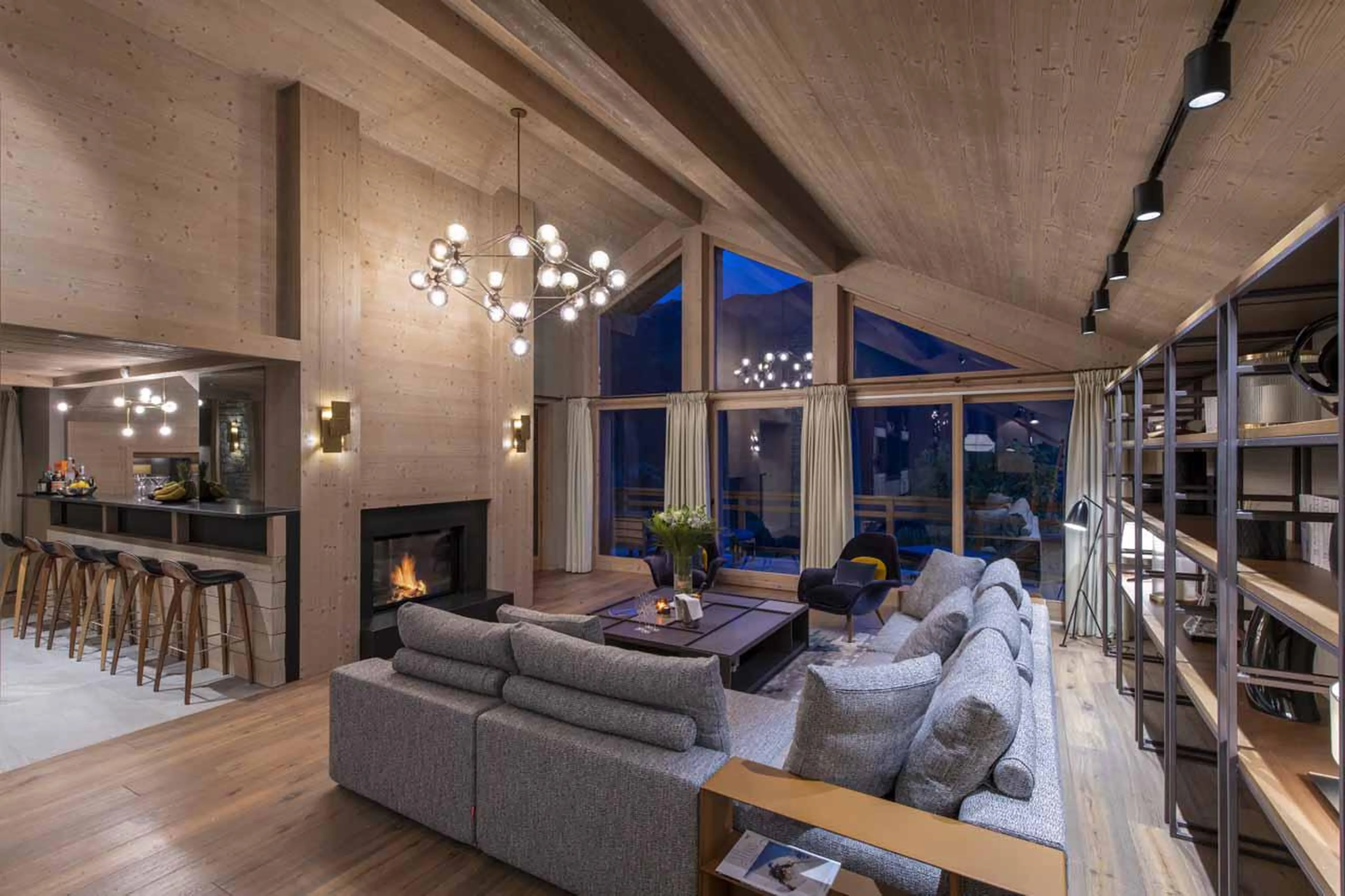 Living room and bar area at Chalet Altius in Meribel
