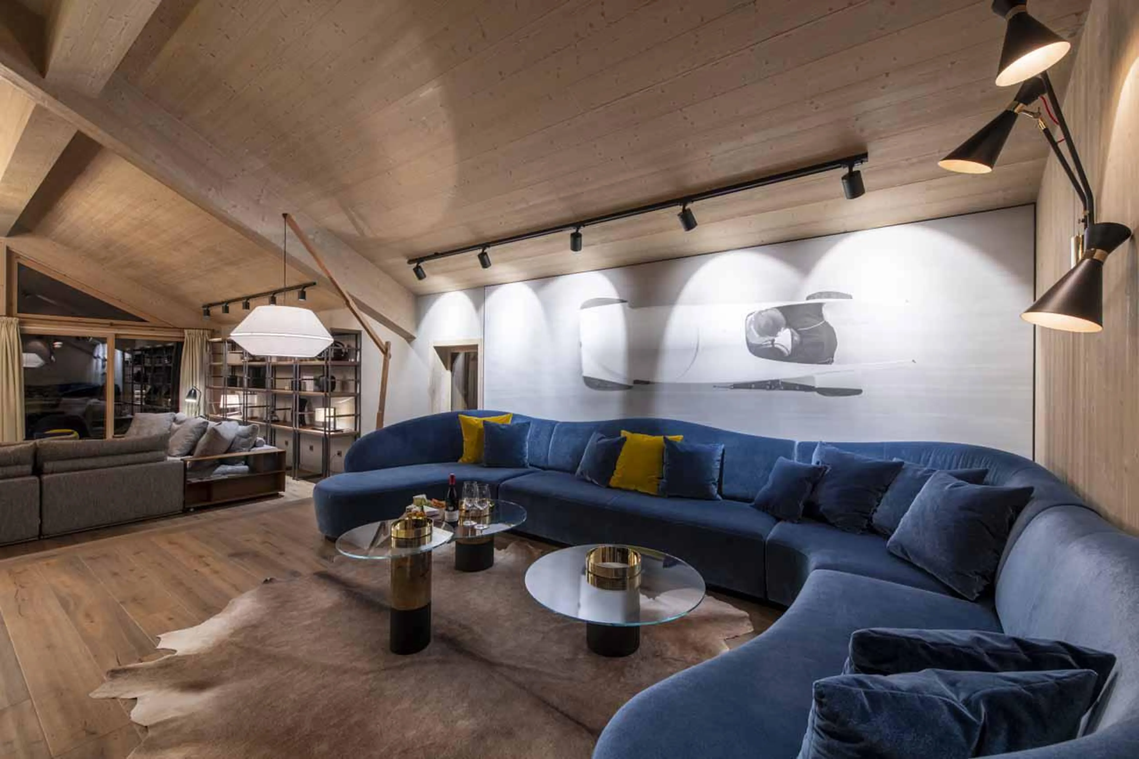 Velvet sofa in TV room at Chalet Altius in Meribel