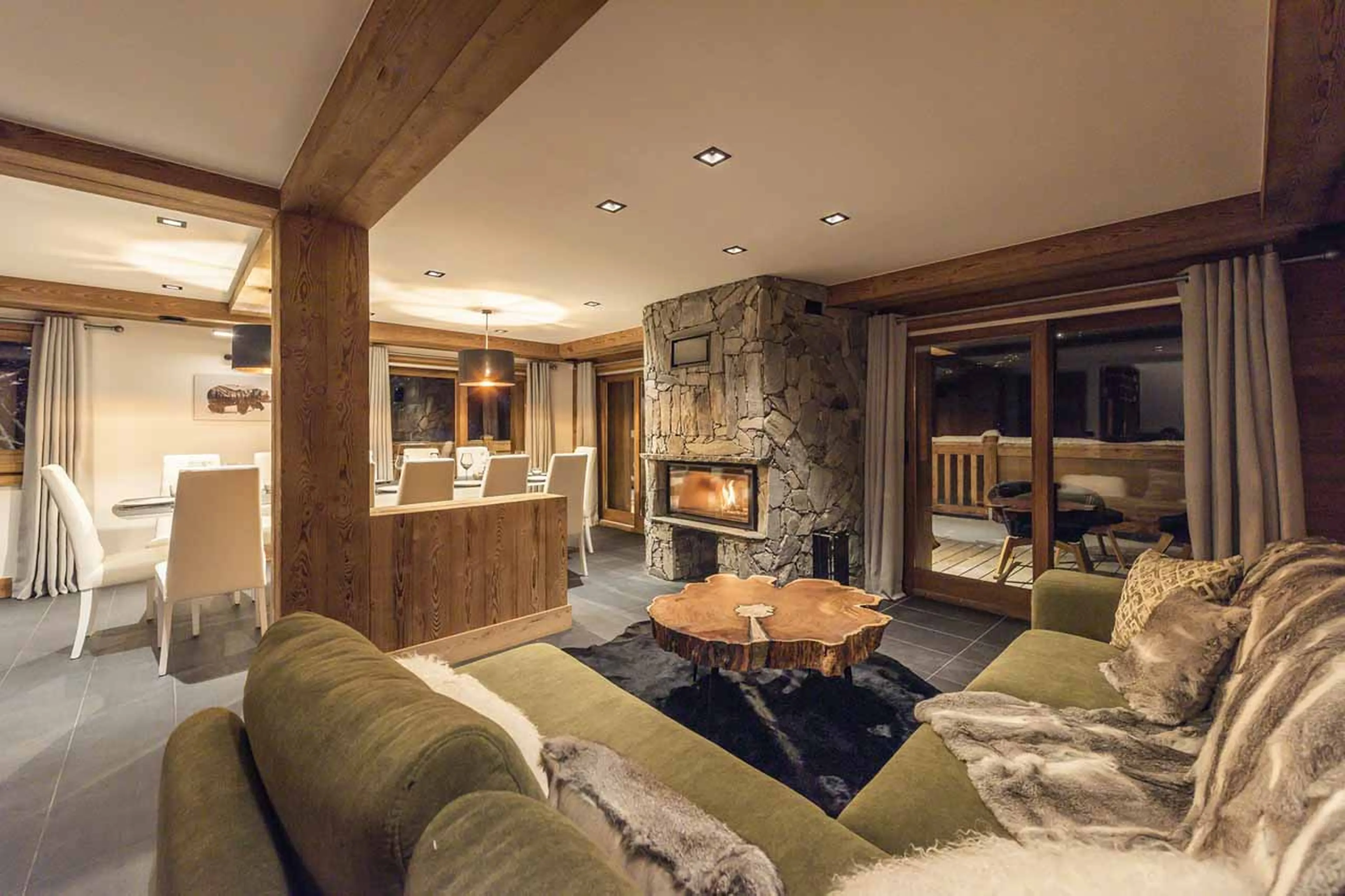 Fireplace in living area of Chalet Alya in Meribel