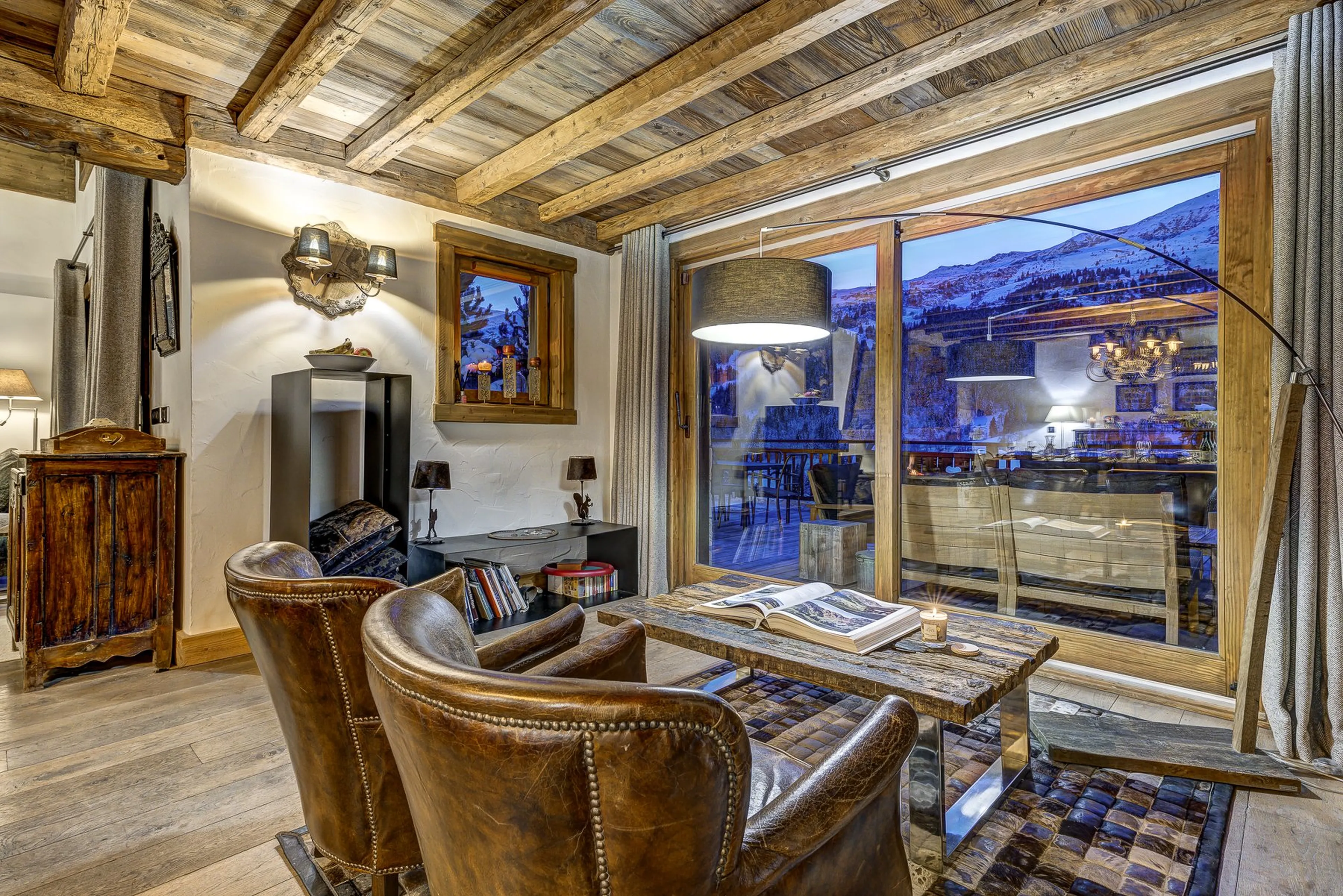 Living area at night in Chalet Amarena in Meribel