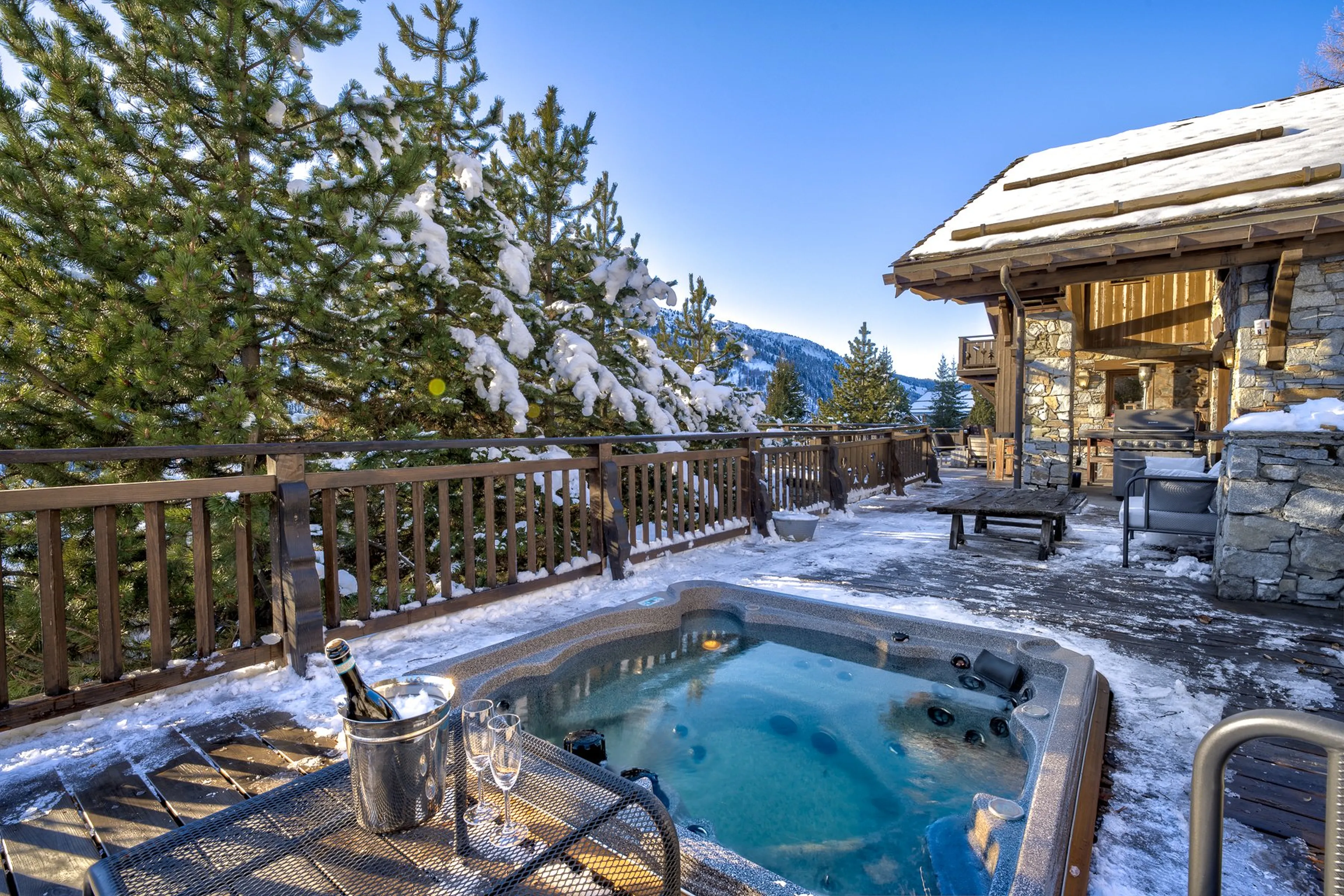 Terrace with Jacuzzi at Chalet Amarena in Meribel
