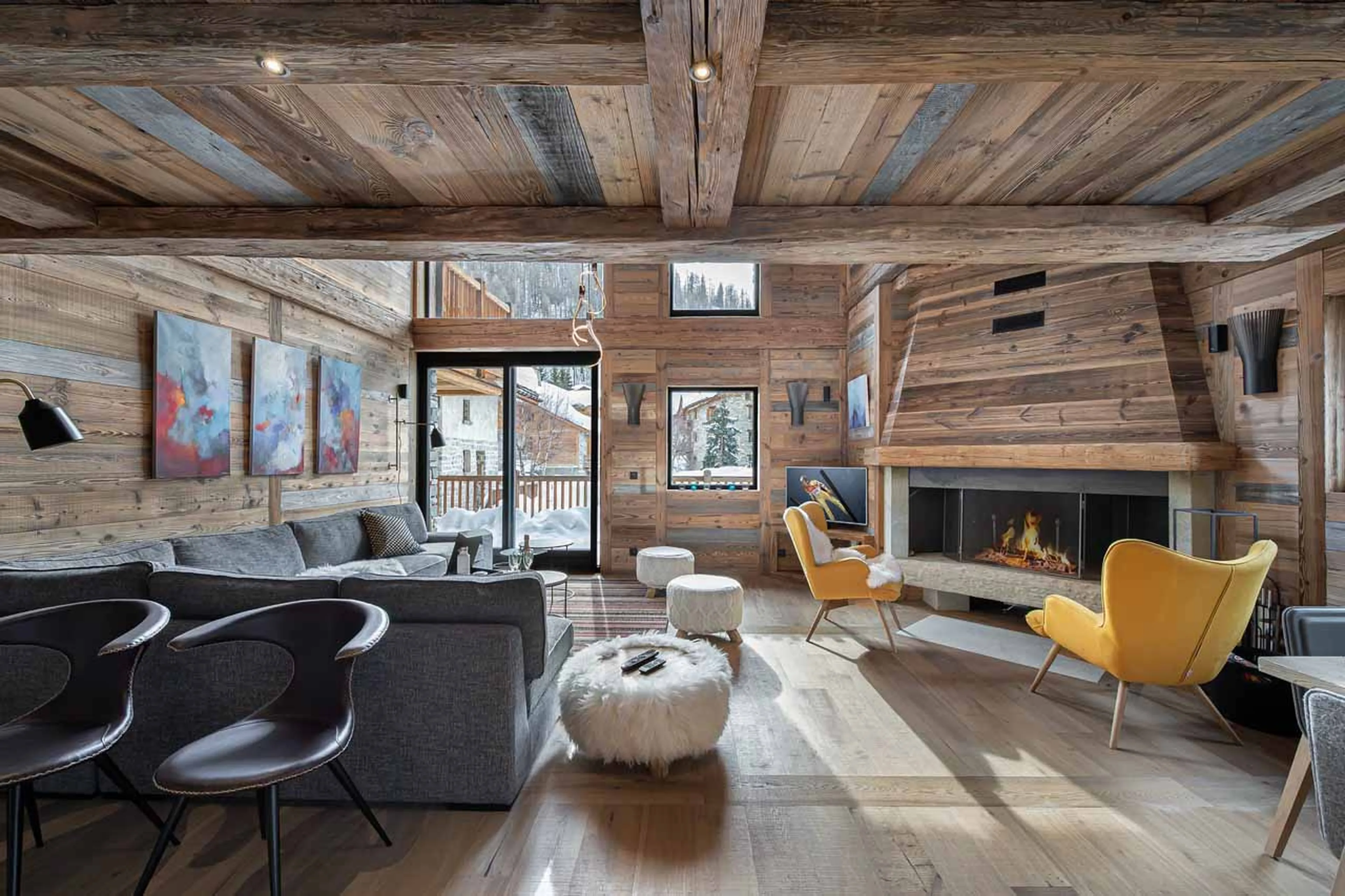 Fireplace in living area of Chalet Angelus 1 in Val d'Isere