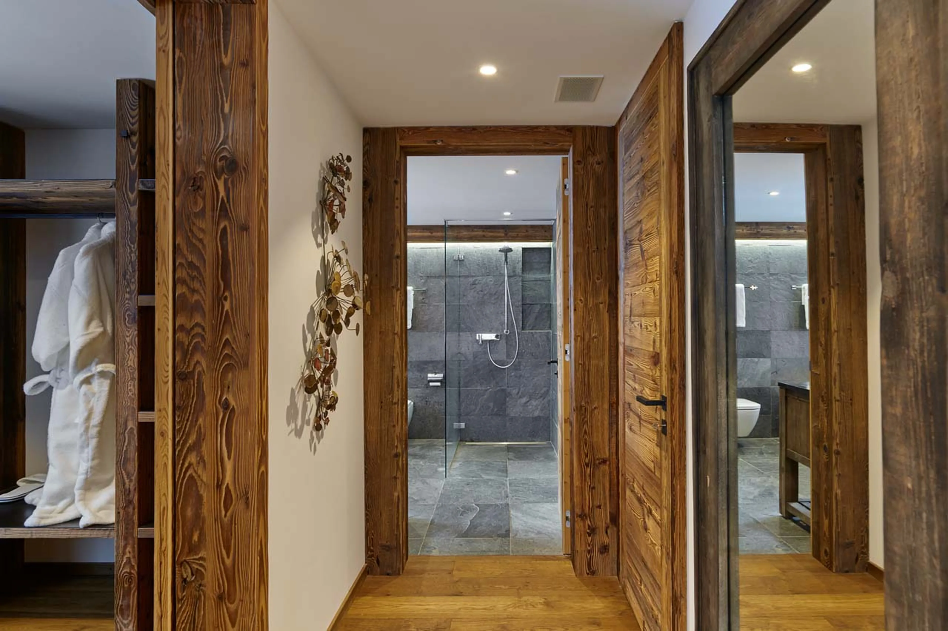 Wardrobe and bathroom at Chalet Annapurna in Saas Fee