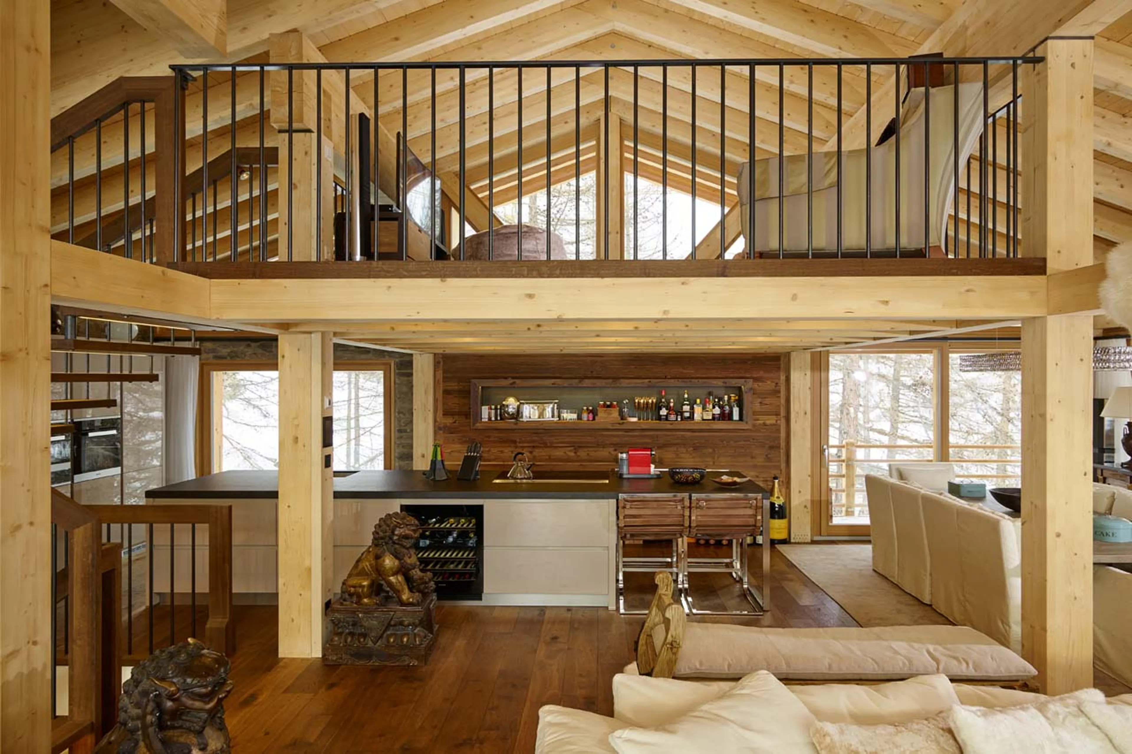 Kitchen and mezzanine at Chalet Annapurna in Saas Fee
