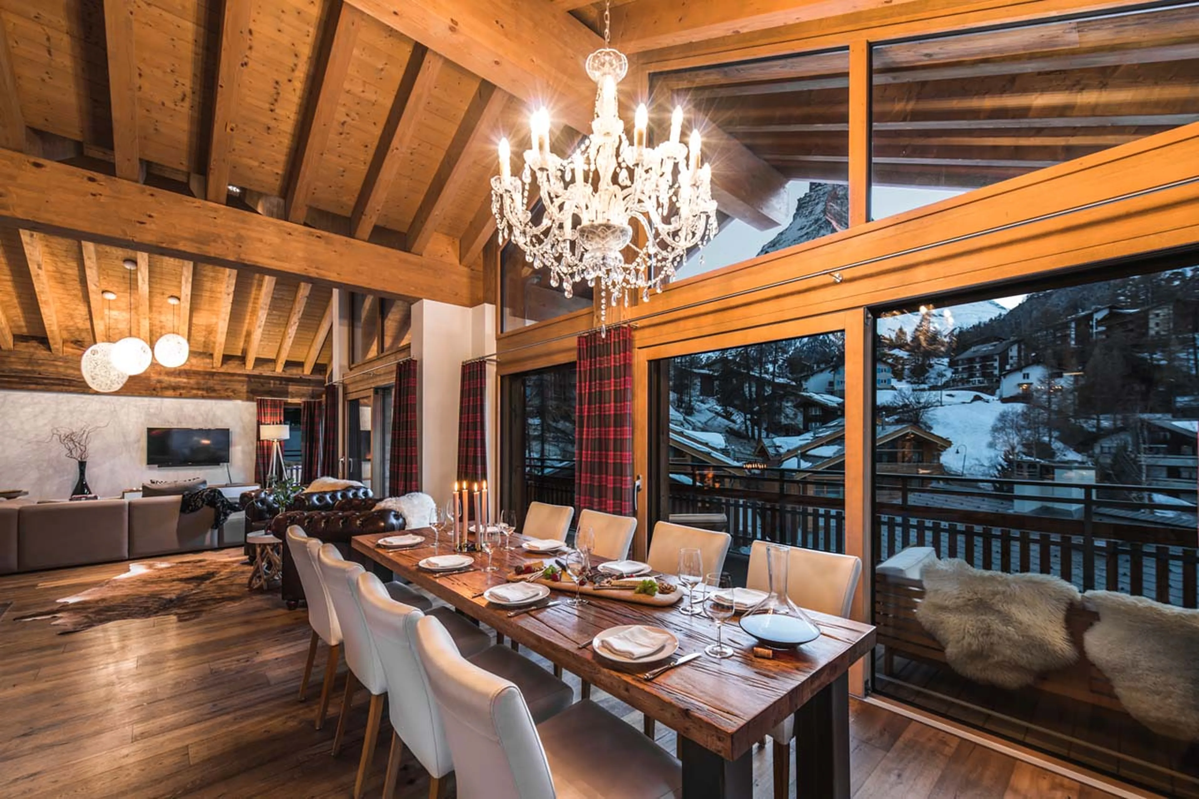 Dining area at night at Penthouse Aria in Zermatt