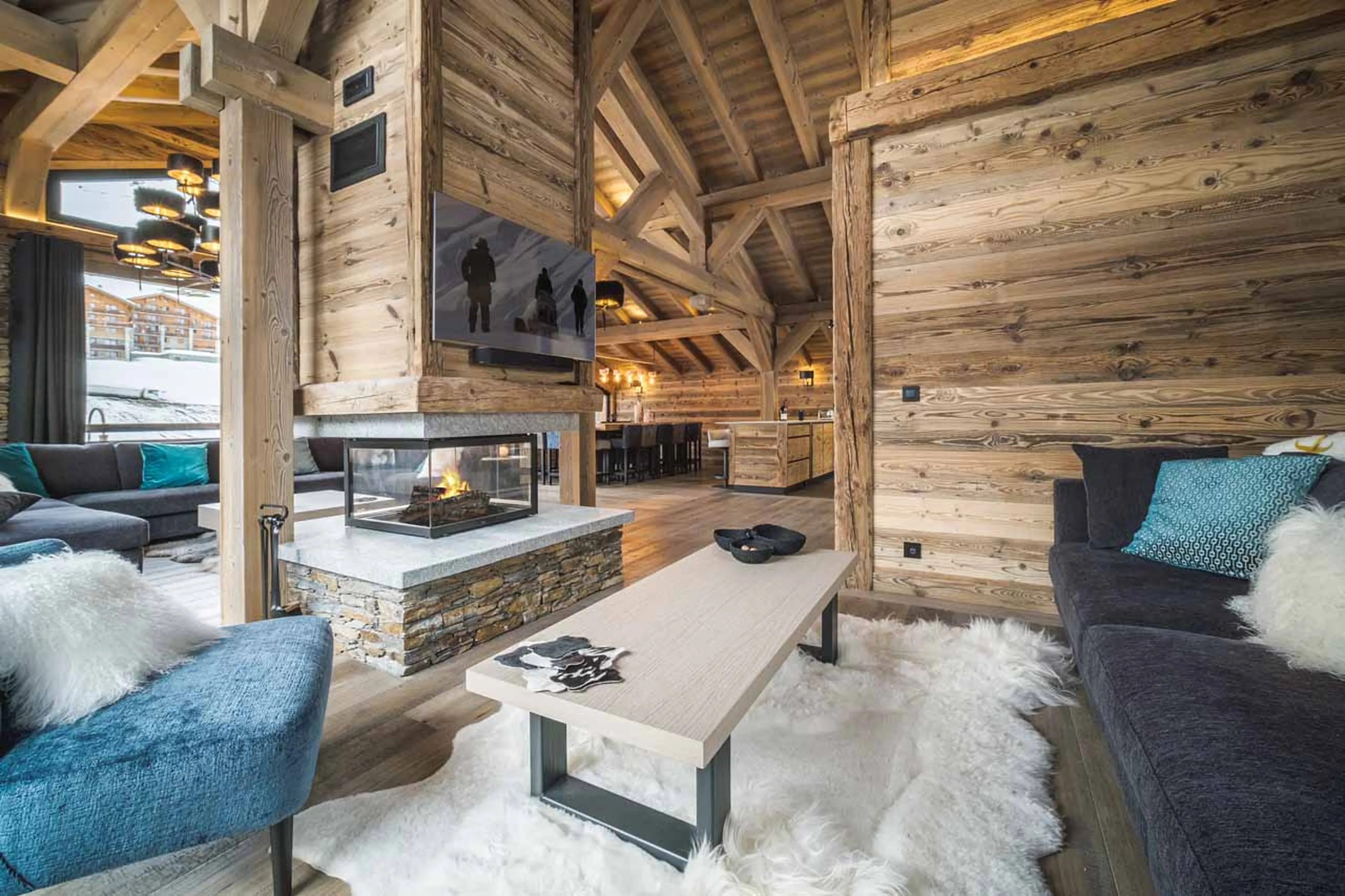 Fireplace and sofas at Chalet Arolla in Tignes