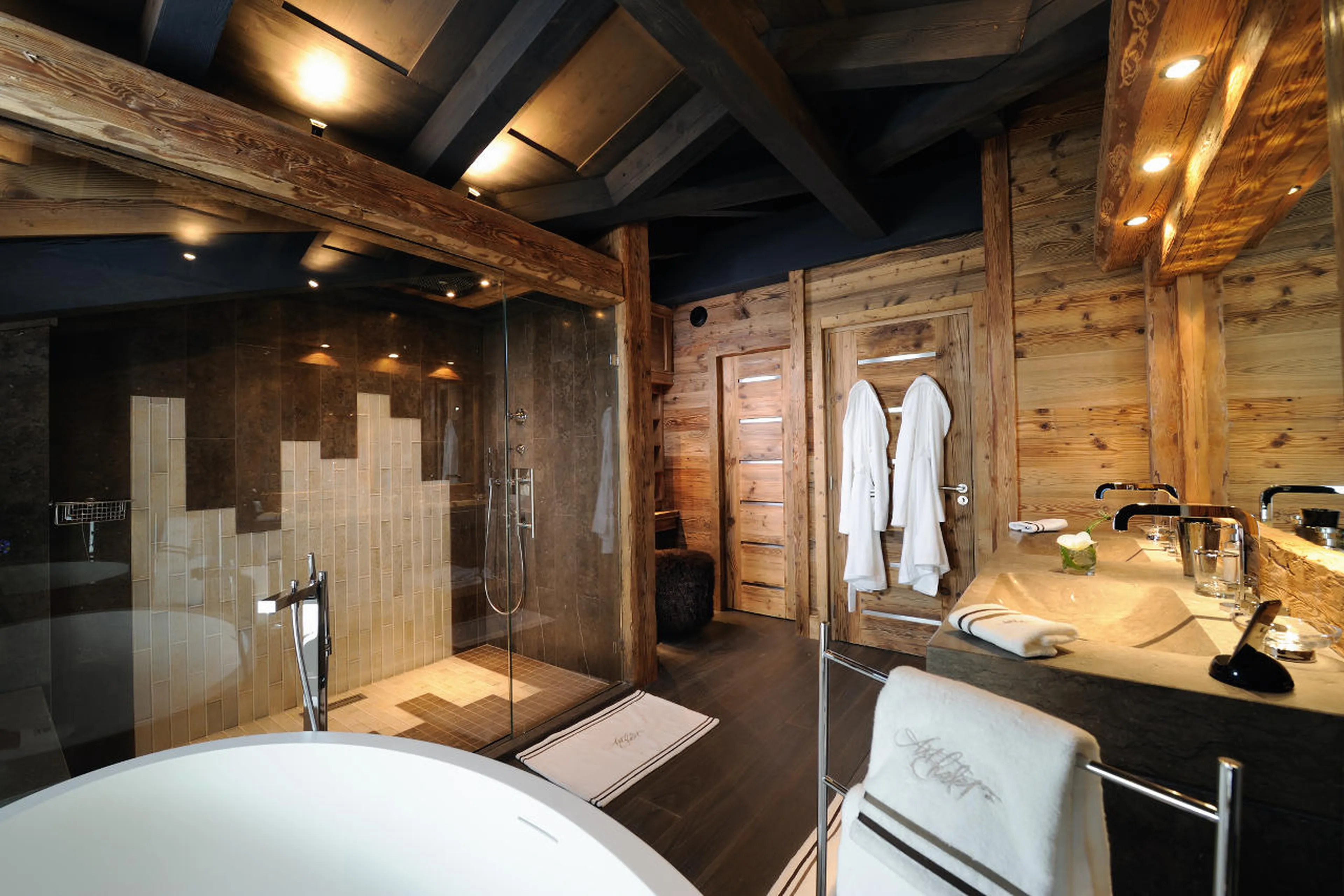Rain shower in Chalet Art in Courchevel 1850 for relaxing after tough day on the slopes