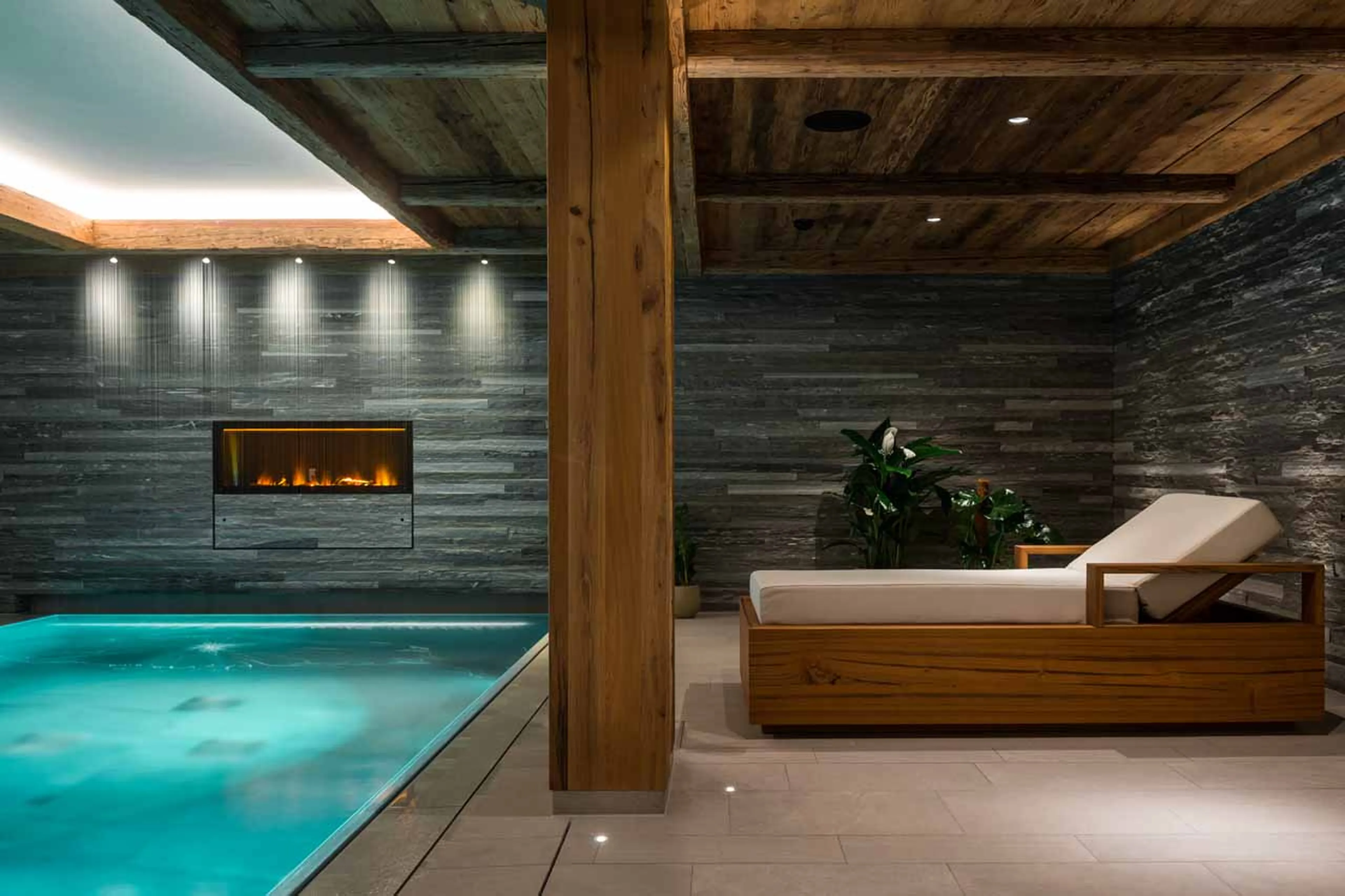 Relaxation beside pool at Chalet Arula 1 in Lech