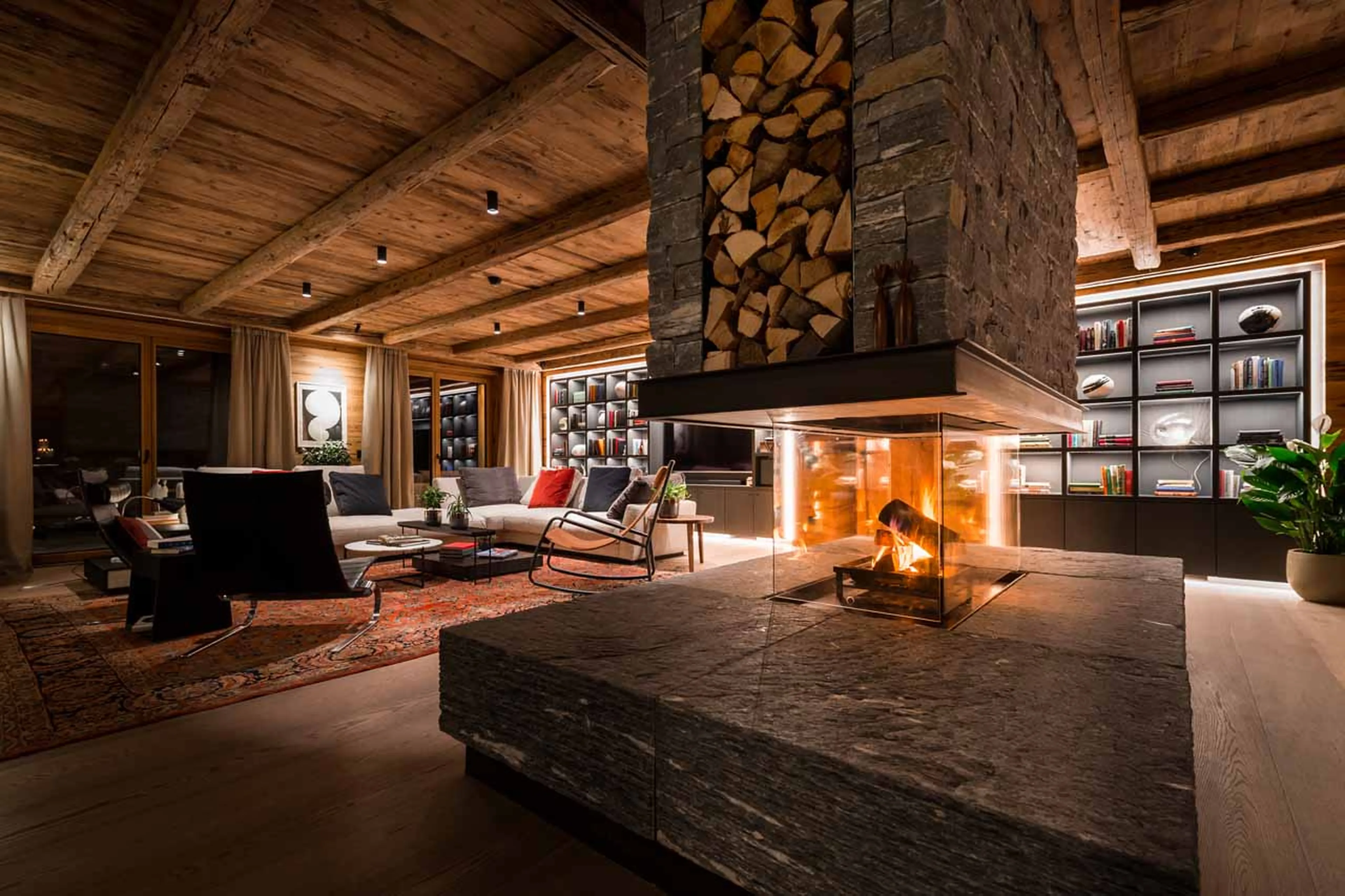 Fireplace in living area at Chalet Arula 2 in Lech