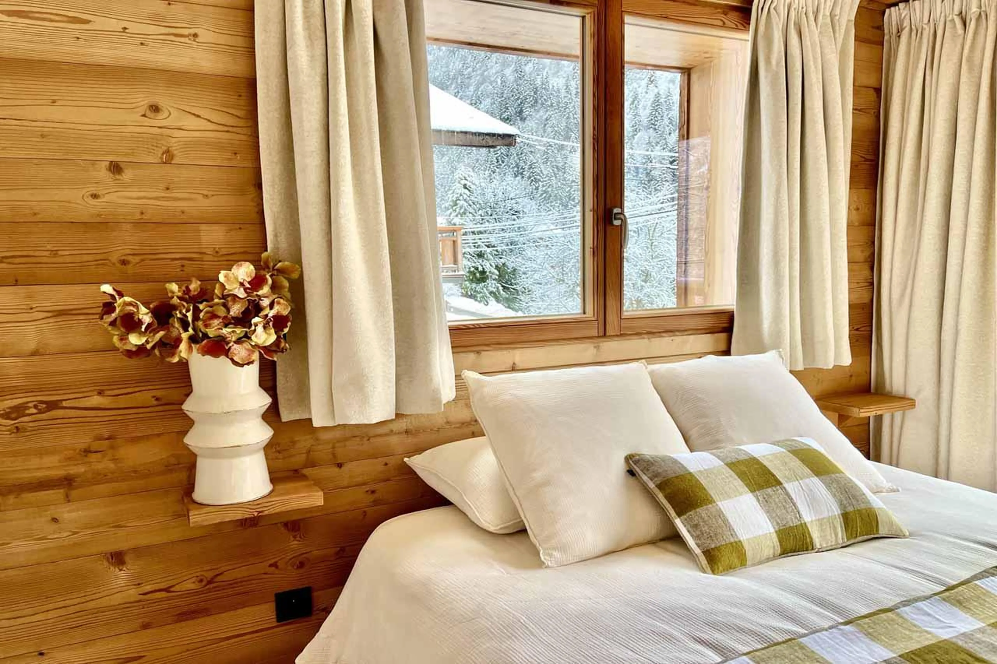 Double bedroom with window in Chalet Asgard, Morzine
