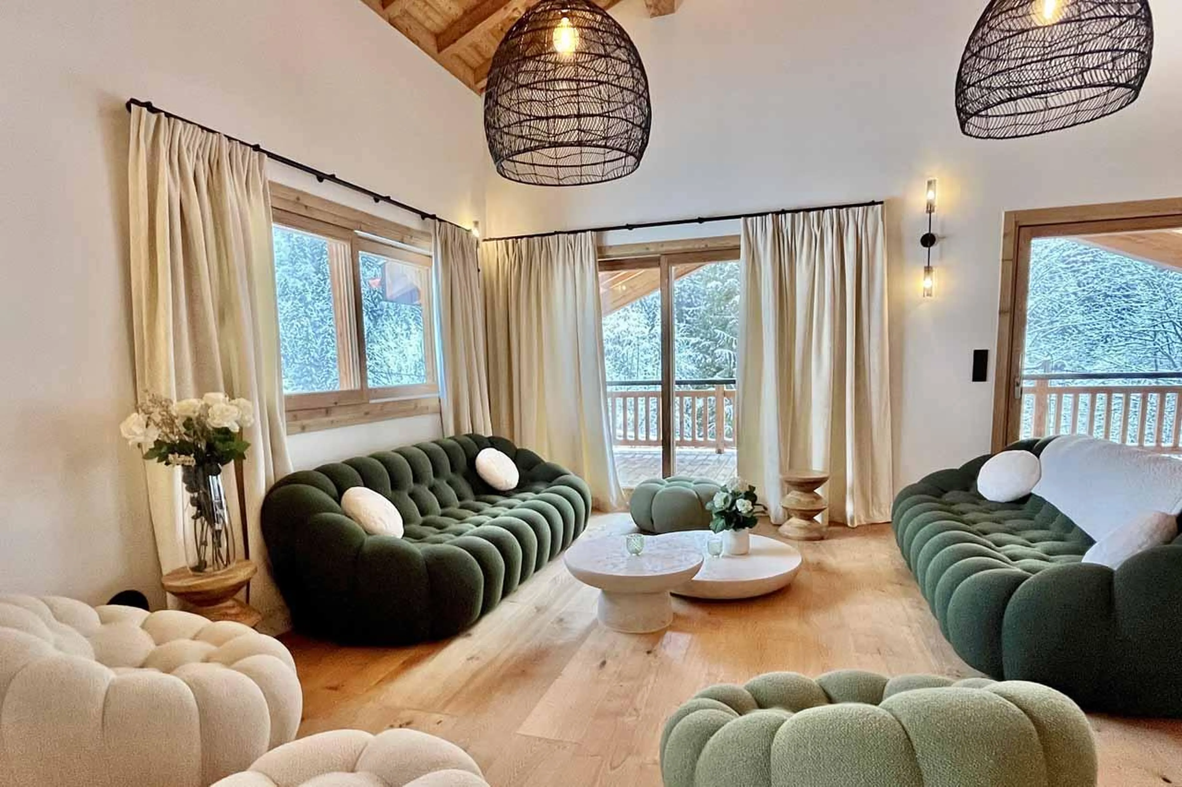 Sofas and sliding glass doors in Chalet Asgard, Morzine