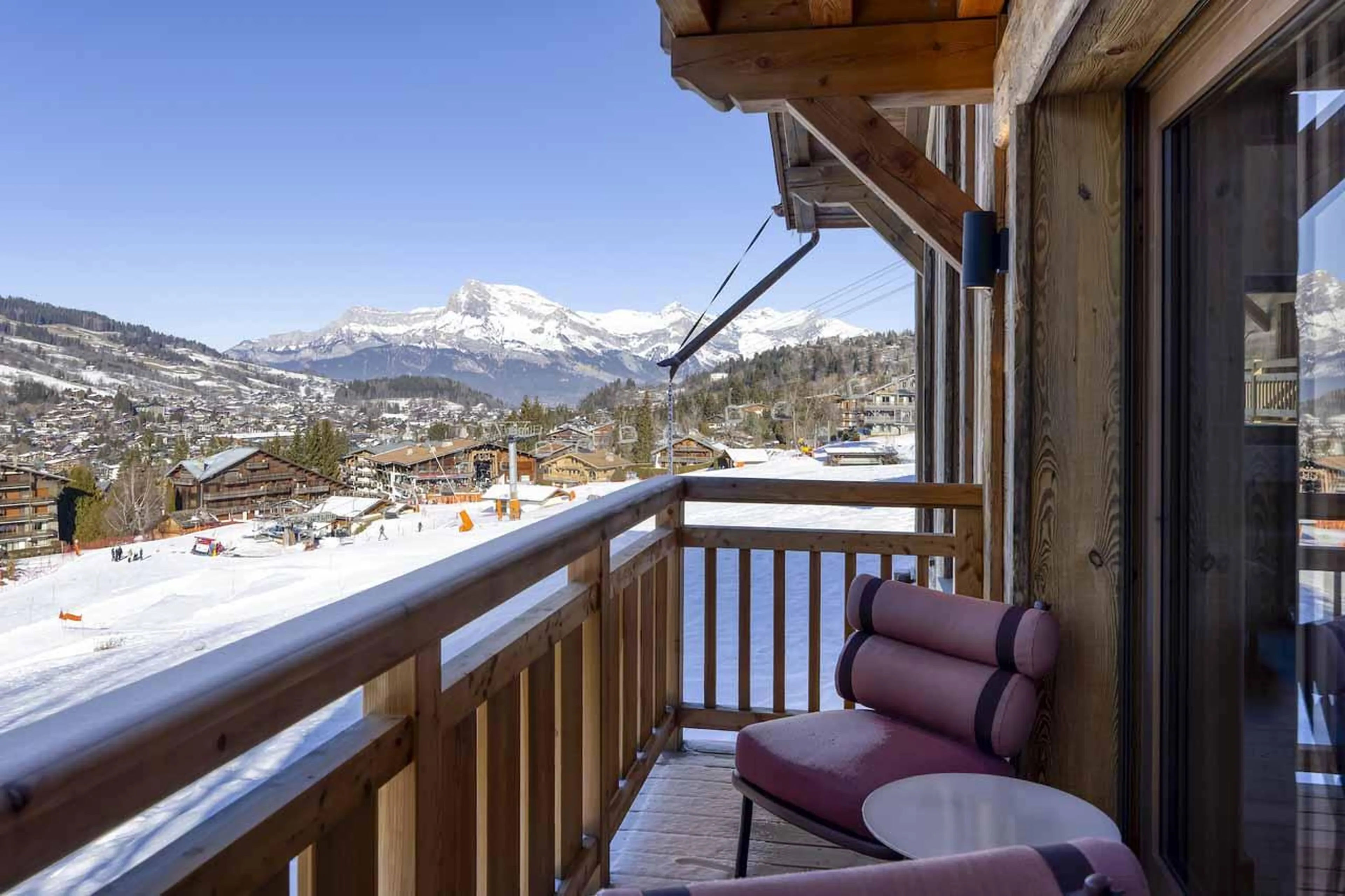 Balcony with seating overlooking slopes in Chalet Aspen, Megeve