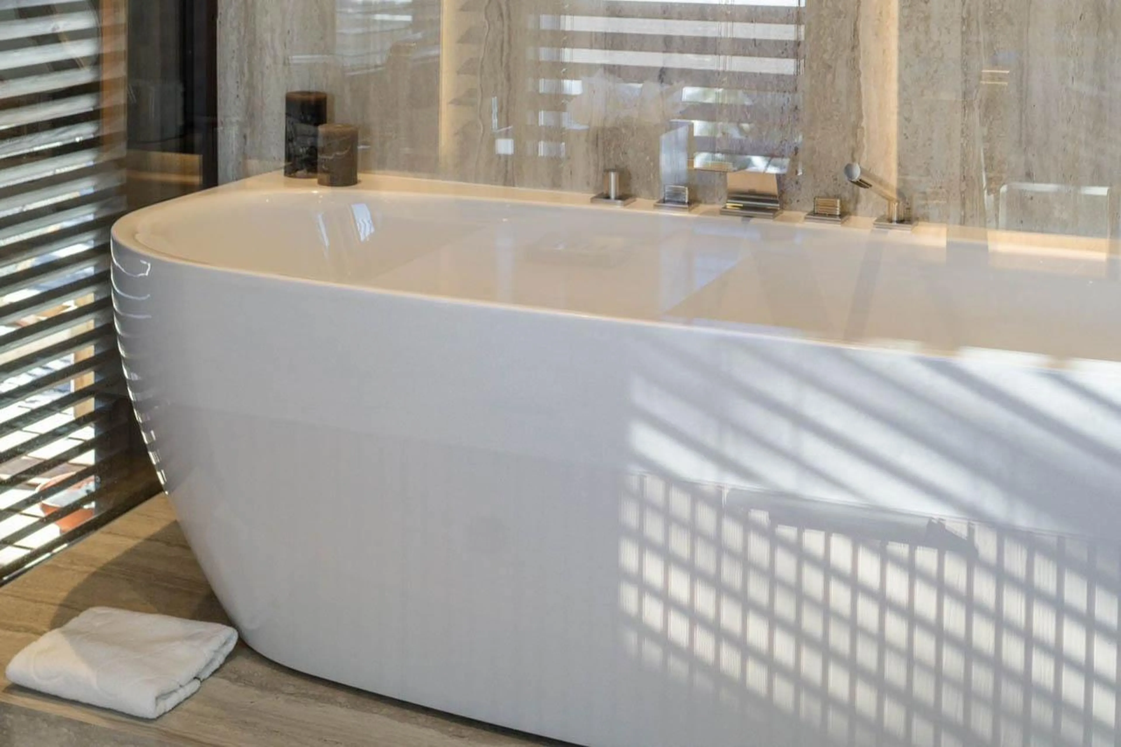 Bath in en-suite bathroom at Chalet B in Courchevel 1850